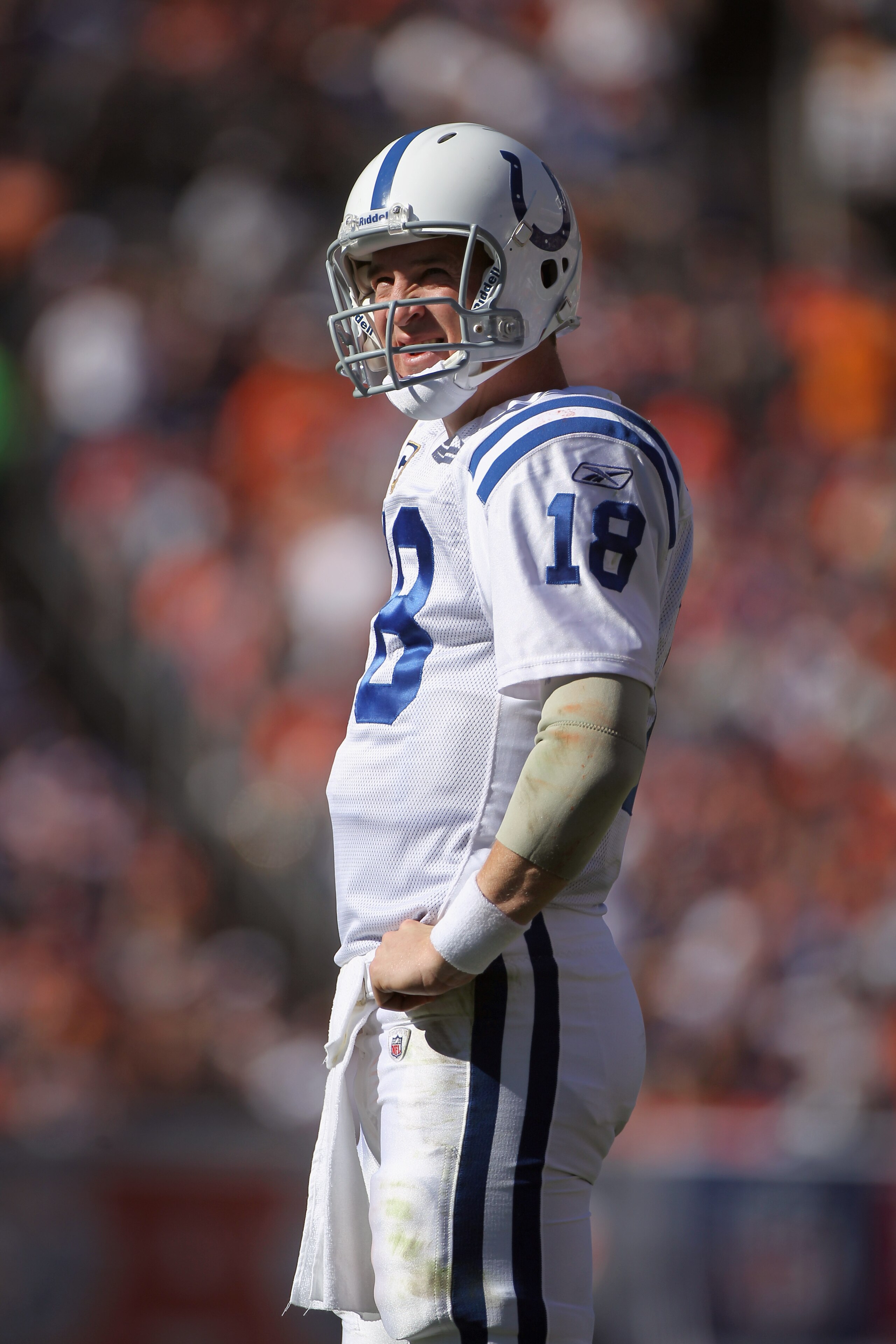 DENVER - SEPTEMBER 26:  Quarterback Peyton Manning #18 of the Indianapolis Colts directs the offense against the Denver Broncos at INVESCO Field at Mile High on September 26, 2010 in Denver, Colorado. The Colts defeated the Broncos 27-13.  (Photo by Doug