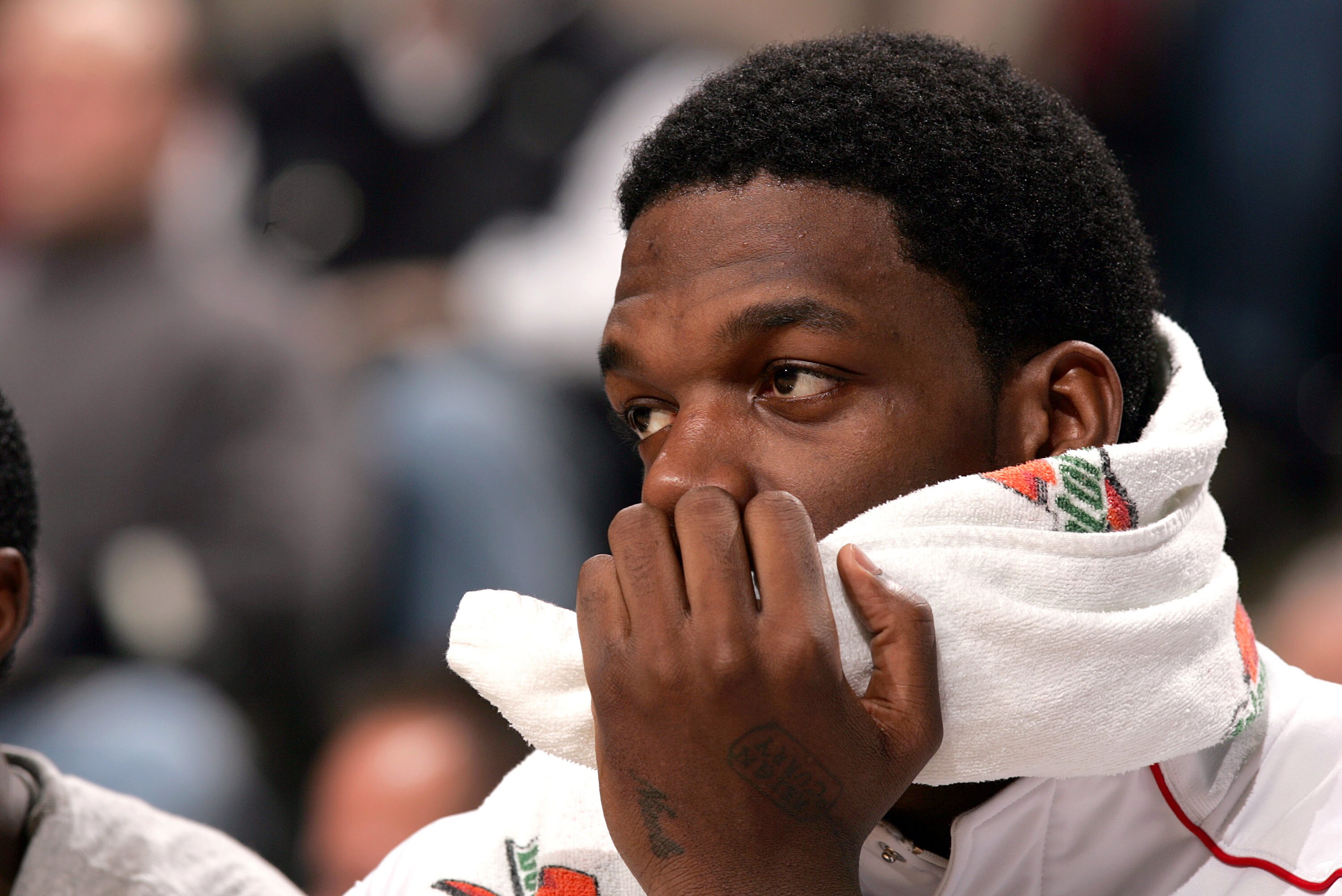 CHICAGO - JANUARY 8:  Eddy Curry #2 of the Chicago Bulls watches his teammates take on the Boston Celtics during a rest on the bench on January 8, 2005 at the United Center in Chicago, Illinois. The Bulls won the game 102-91.  NOTE TO USER: User expressly
