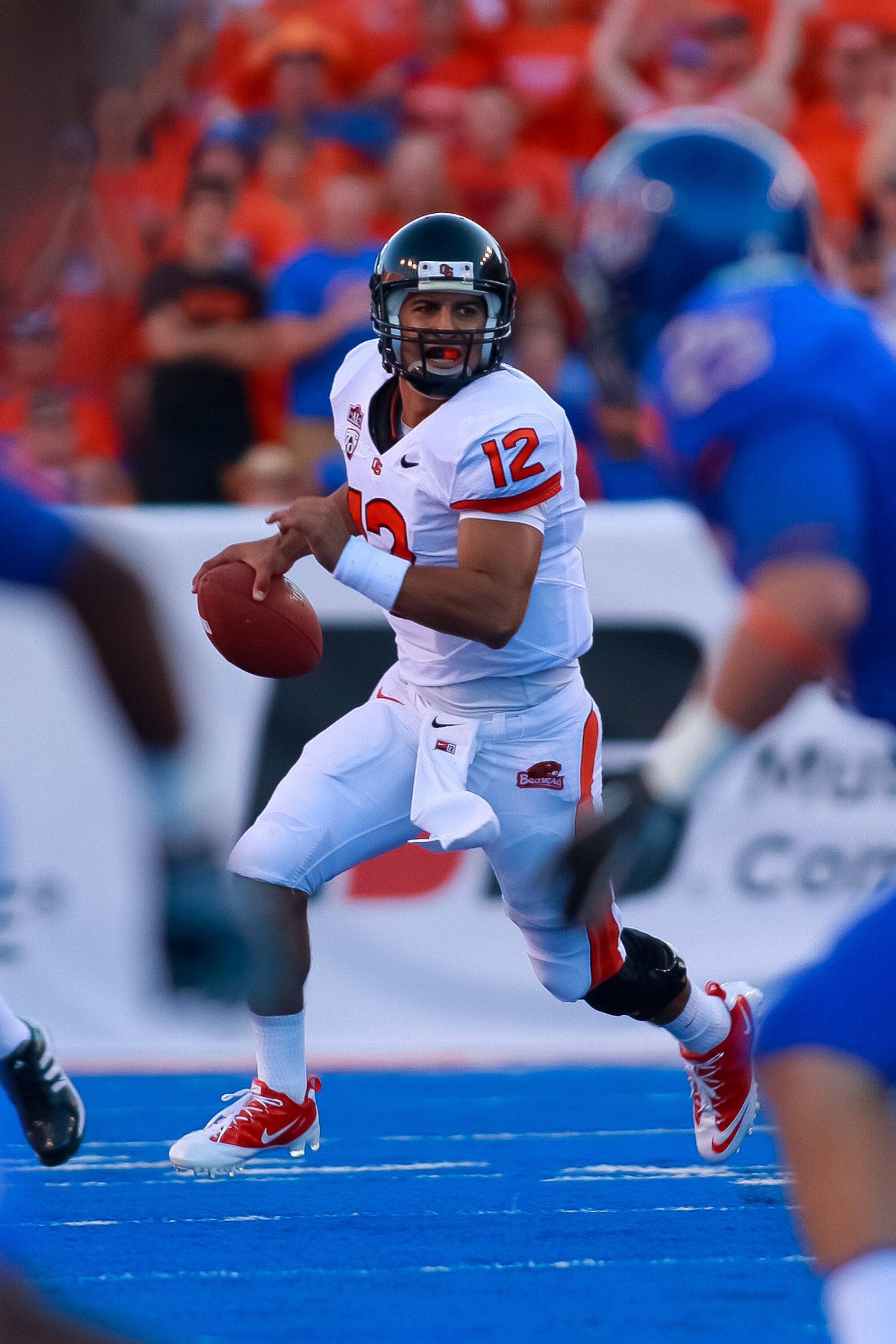 BOISE, ID - SEPTEMBER 25:  Quarterback Ryan Katz #12 of the Oregon State Beavers looks for a receiver against the Boise State Broncos at Bronco Stadium on September 25, 2010 in Boise, Idaho.  (Photo by Otto Kitsinger III/Getty Images)