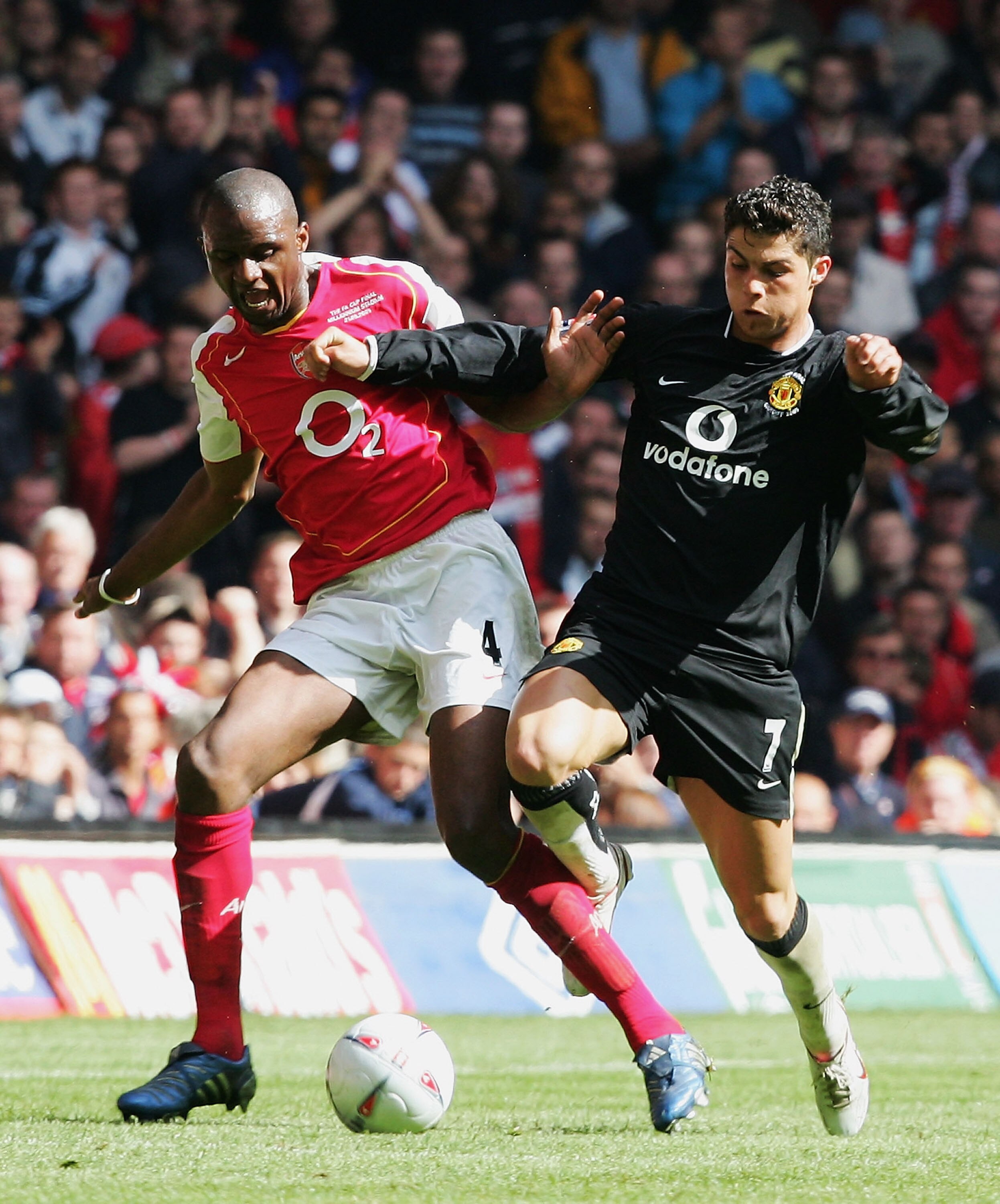 CARDIFF, UNITED KINGDOM - MAY 21:  Patrick Vieira of Arsenal and Ronaldo of Manchester United battle for the ball during the FA Cup Final between Arsenal and Manchester United at The Millennium Stadium on May 21, 2005 in Cardiff, Wales.  (Photo by Ross Ki