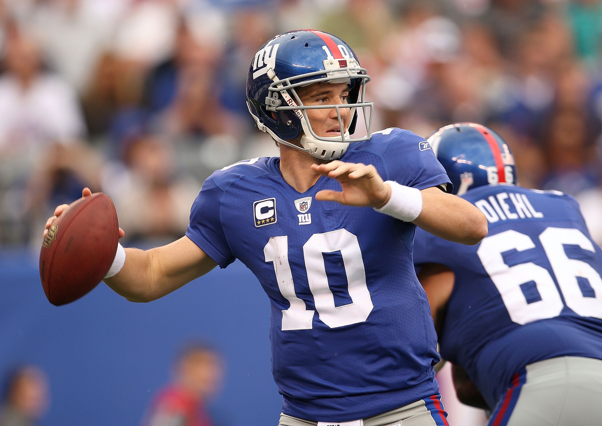 EAST RUTHERFORD, NJ - SEPTEMBER 26: Eli Manning #10 of the New York Giants passes during a game against the Tennessee Titans at New Meadowlands Stadium on September 26, 2010 in East Rutherford, New Jersey. (Photo by Mike Ehrmann/Getty Images) EAST RUTHERFORD, NJ - SEPTEMBER 26: Eli Manning #10 of the New York Giants passes during a game against the Tennessee Titans at New Meadowlands Stadium on September 26, 2010 in East Rutherford, New Jersey. (Photo by Mike Ehrmann/Getty Images)