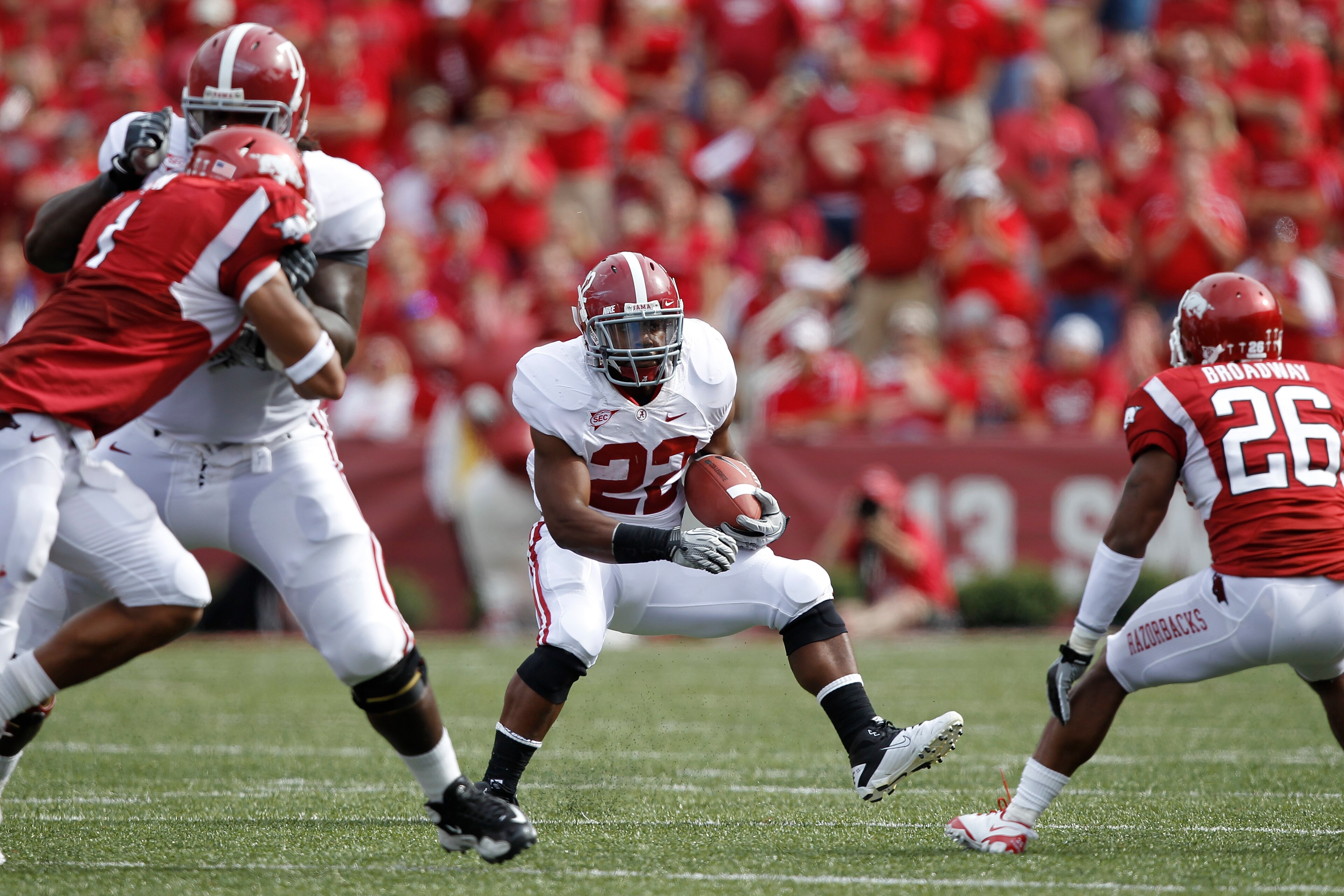 FAYETTEVILLE - SEPTEMBER 25: Mark Ingram #22 of the Alabama Crimson Tide runs the ball against the Arkansas Razorbacks at Donald W. Reynolds Razorback Stadium on September 25, 2010 in Fayetteville, Arkansas. Alabama won 24-20. (Photo by Joe Robbins/Getty