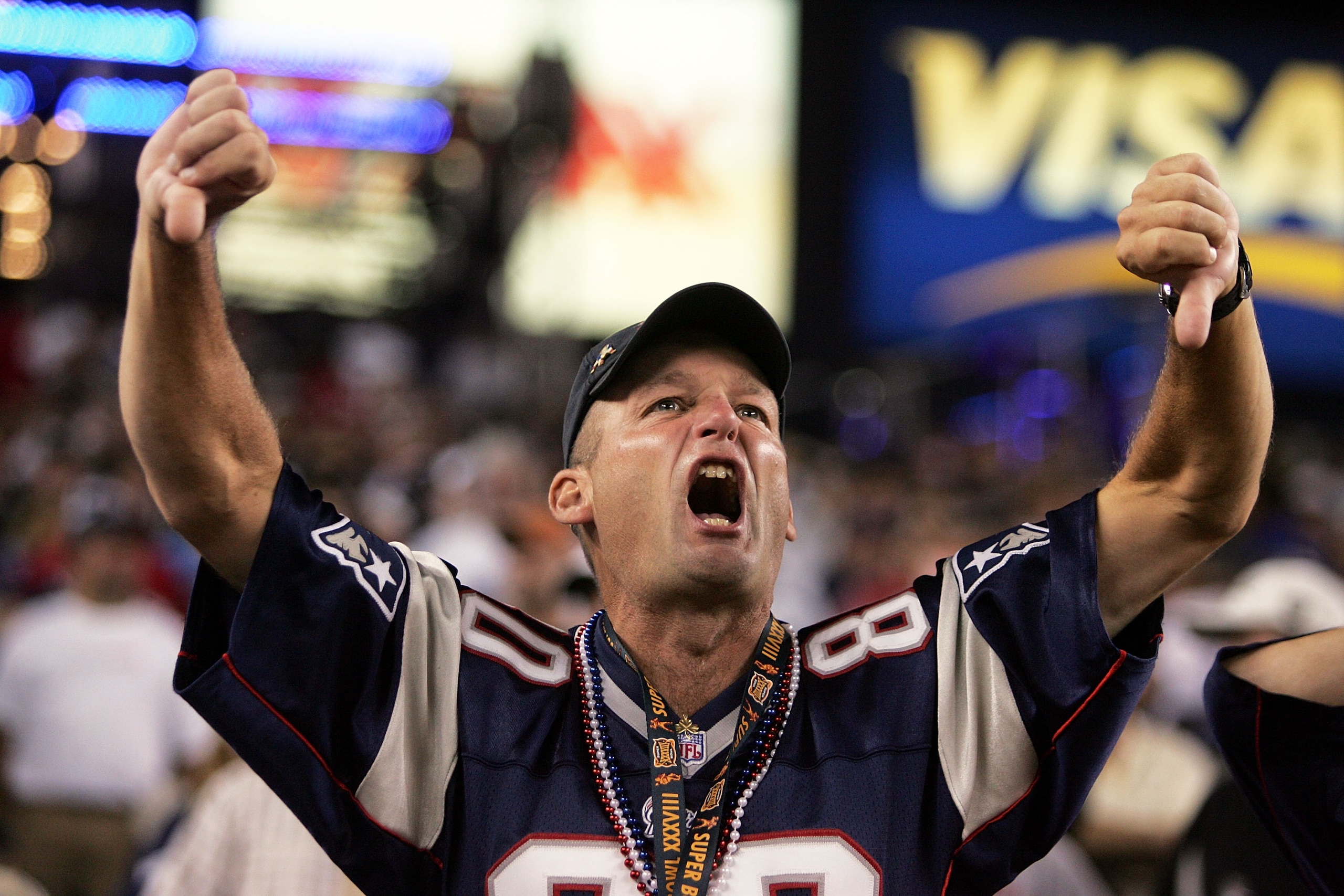 FOXBORO, MA - SEPTEMBER 8: A fan of the New England Patriots boos the Oakland Raiders before their 2005 NFL opening game at Gillette Stadium on September 8, 2005 in Foxboro, Massachusetts. (Photo by Nick Laham/Getty Images) FOXBORO, MA - SEPTEMBER 8: A fan of the New England Patriots boos the Oakland Raiders before their 2005 NFL opening game at Gillette Stadium on September 8, 2005 in Foxboro, Massachusetts. (Photo by Nick Laham/Getty Images)