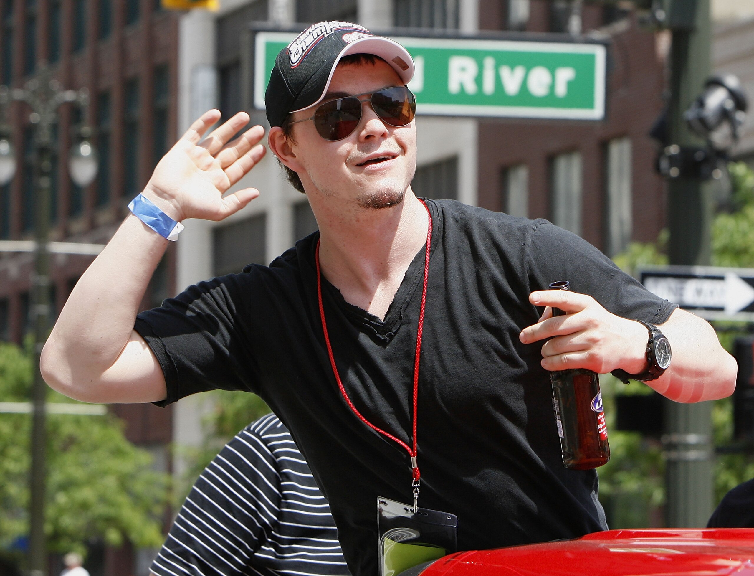 DETROIT - JUNE 06:  Jiri Hudler #26 of the Detroit Red Wings reacts to the crowd during a parade to celebrate winning the 2008 Stanley Cup on June 6, 2008 in Detroit, Michigan.  (Photo by Gregory Shamus/Getty Images)