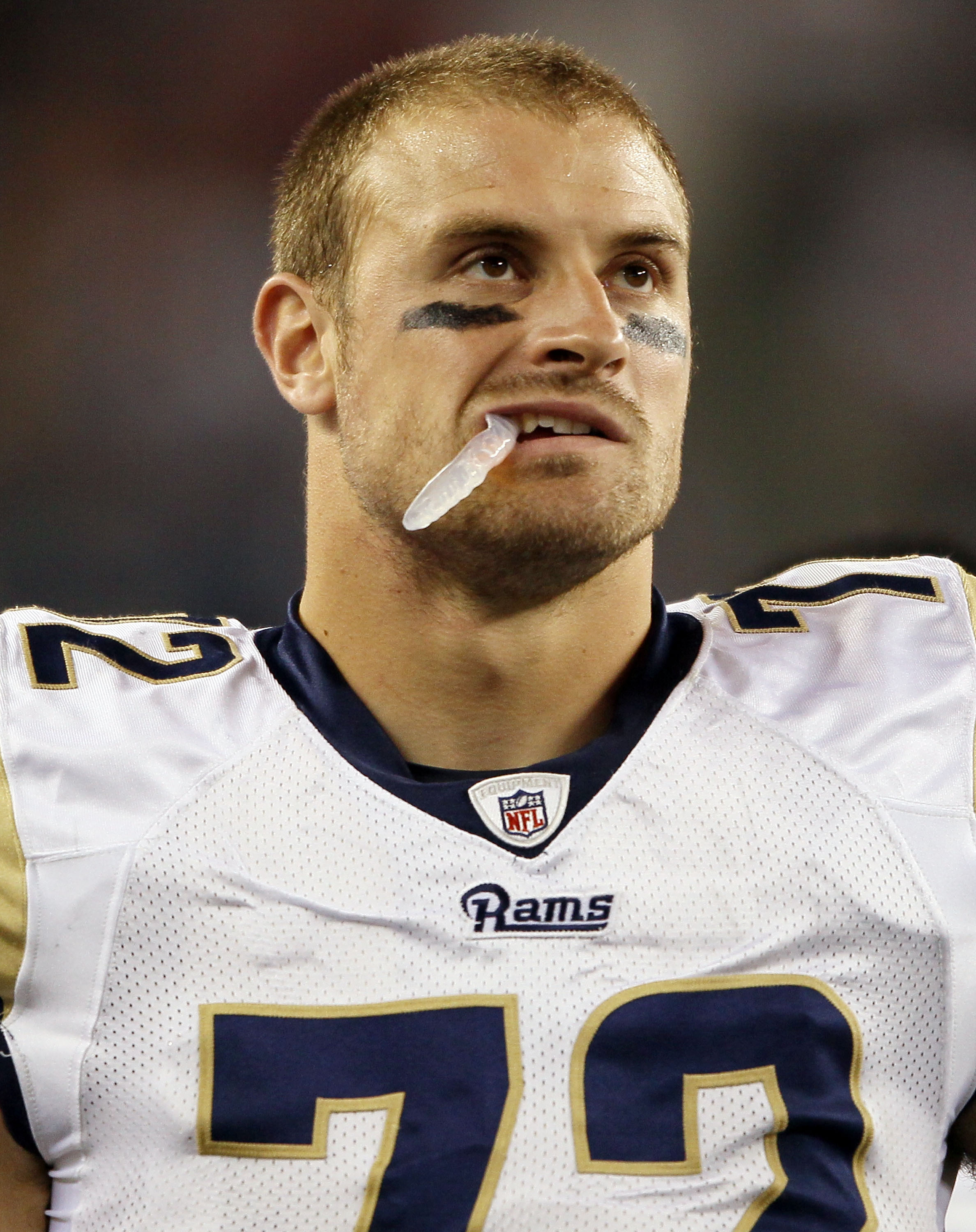 FOXBORO, MA - AUGUST 26:  Chris Long #72 of the St. Louis Rams looks on from the sideline against the New England Patriots on August 26, 2010 at Gillette Stadium in Foxboro, Massachusetts.  (Photo by Elsa/Getty Images)