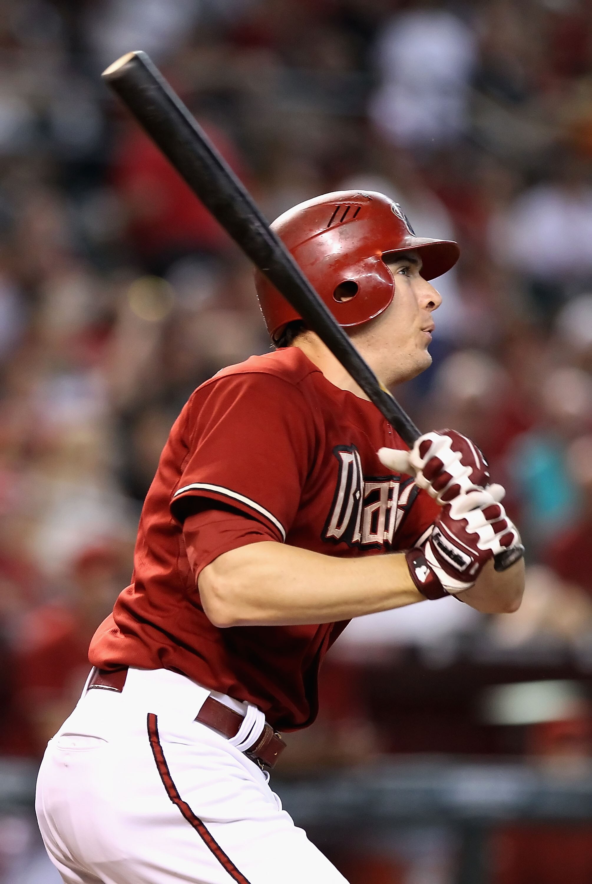 PHOENIX - SEPTEMBER 06:  Kelly Johnson #2 of the Arizona Diamondbacks hits a single against the San Francisco Giants during the Major League Baseball game at Chase Field on September 6, 2010 in Phoenix, Arizona.  (Photo by Christian Petersen/Getty Images)