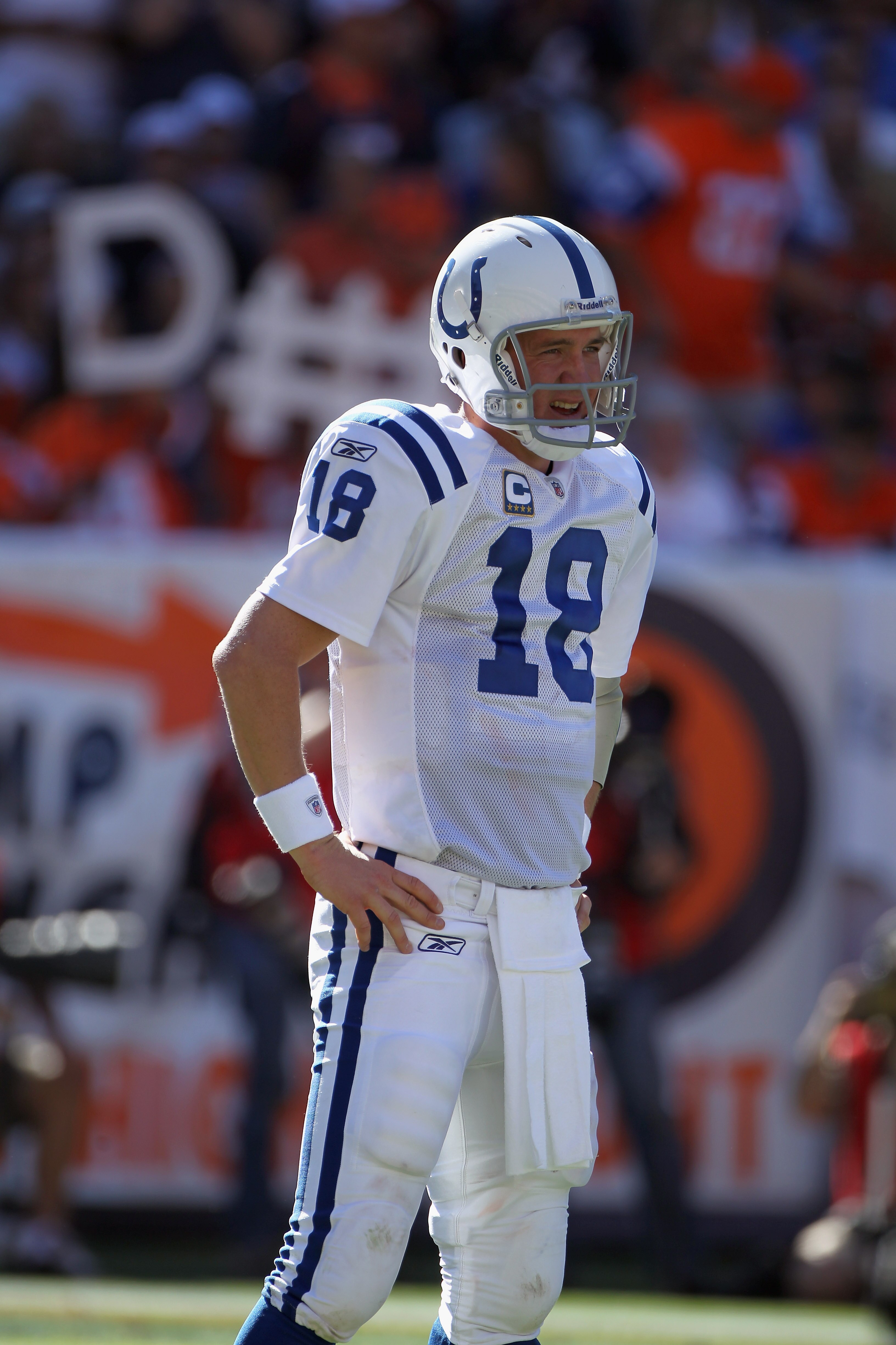 DENVER - SEPTEMBER 26:  Quarterback Peyton Manning #18 of the Indianapolis Colts directs the offense against the Denver Broncos at INVESCO Field at Mile High on September 26, 2010 in Denver, Colorado. The Colts defeated the Broncos 27-13.  (Photo by Doug