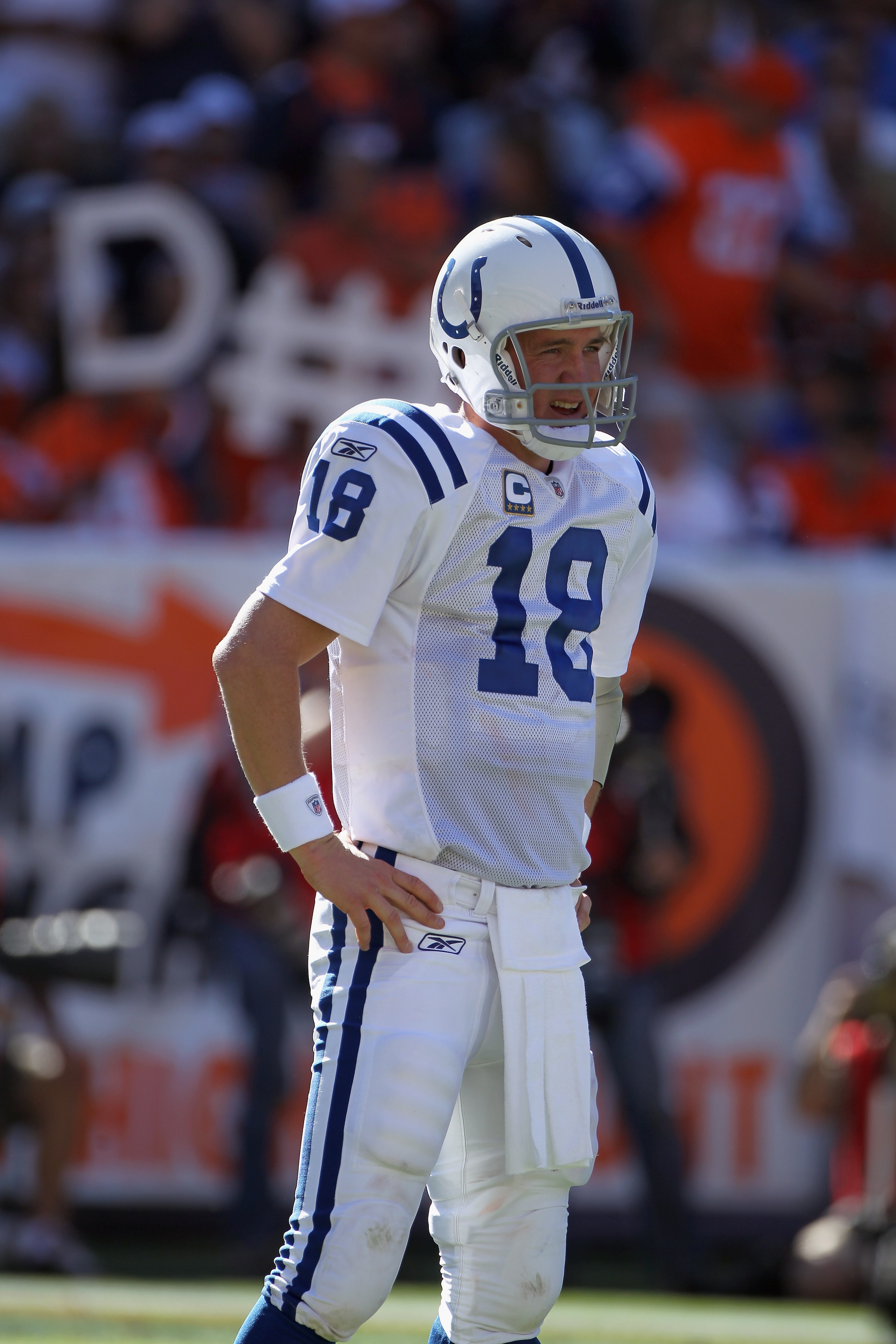 DENVER - SEPTEMBER 26:  Quarterback Peyton Manning #18 of the Indianapolis Colts directs the offense against the Denver Broncos at INVESCO Field at Mile High on September 26, 2010 in Denver, Colorado. The Colts defeated the Broncos 27-13.  (Photo by Doug