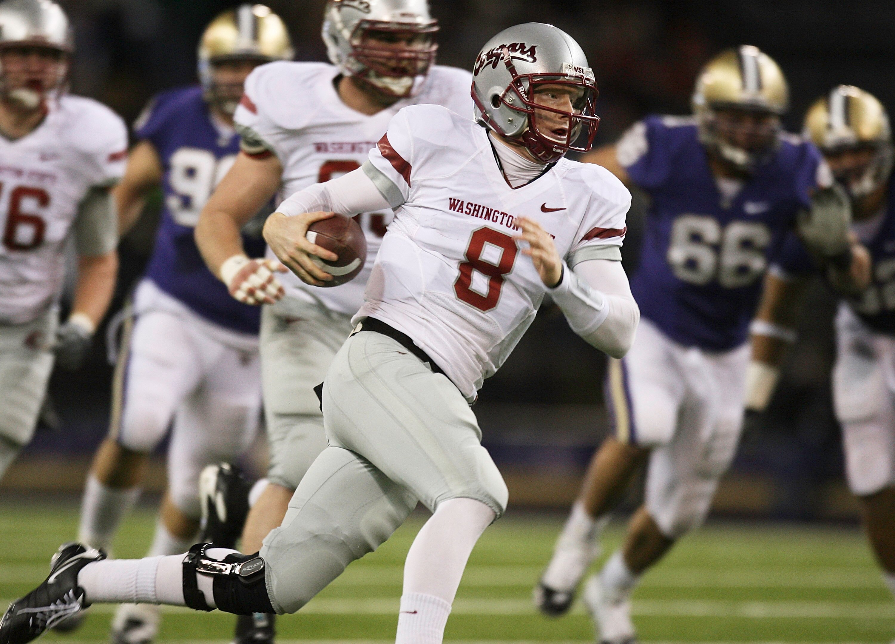 SEATTLE - NOVEMBER 28:  Quarterback Marshall Lobbestael #8 of the Washington State Cougars rushes against the Washington Huskies on November 28, 2009 at Husky Stadium in Seattle, Washington. (Photo by Otto Greule Jr/Getty Images)