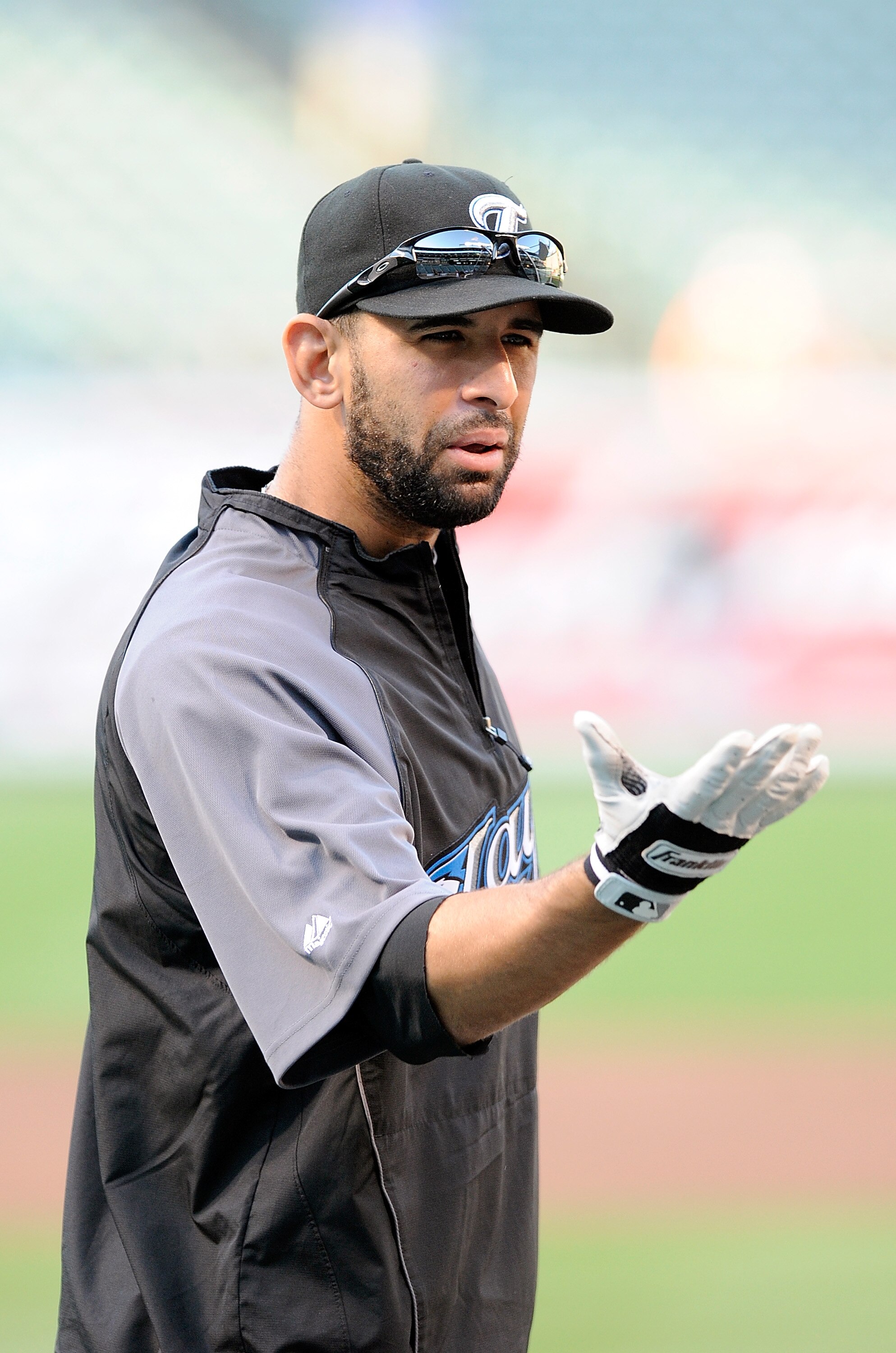 BALTIMORE - SEPTEMBER 13:  Jose Bautista #19 of the Toronto Blue Jays warms up before the game against the Baltimore Orioles at Camden Yards on September 13, 2010 in Baltimore, Maryland.  (Photo by Greg Fiume/Getty Images)