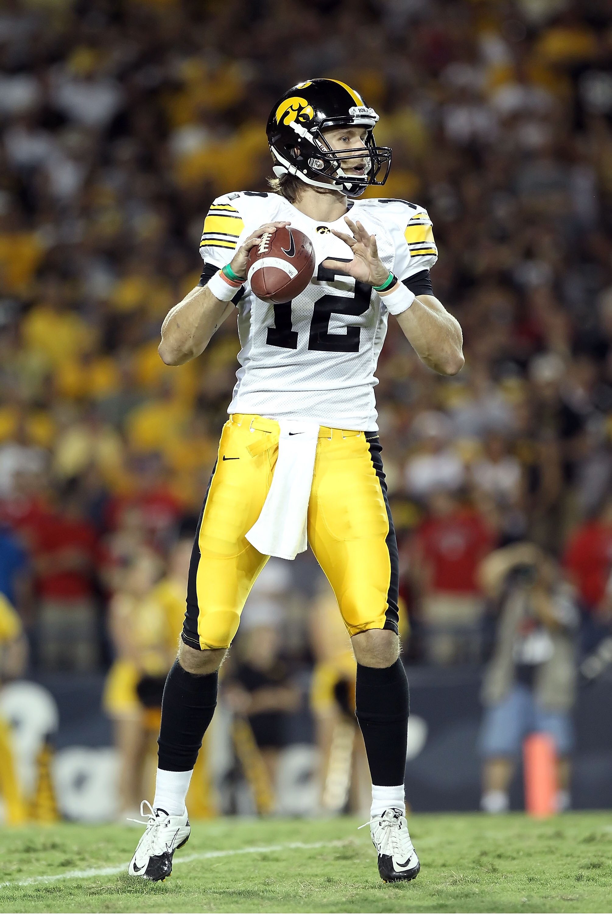TUCSON, AZ - SEPTEMBER 18:  Quarterback Ricky Stanzi #12 of the Iowa Hawkeyes in action during the college football game against the Arizona Wildcats at Arizona Stadium on September 18, 2010 in Tucson, Arizona.  The Wildcats defeated the Hawkeyes 34-27.