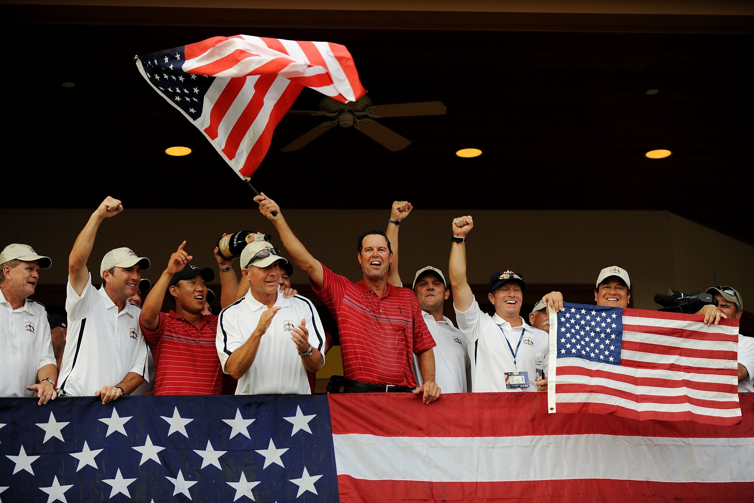 LOUISVILLE, KY - SEPTEMBER 21:  Anthony Kim (3rd Left) and Captain Paul Azinger (C) of the USA team celebrate with players and caddies during the USA 16 1/2 - 11 1/2 victory on the final day of the 2008 Ryder Cup at Valhalla Golf Club on September 21, 200