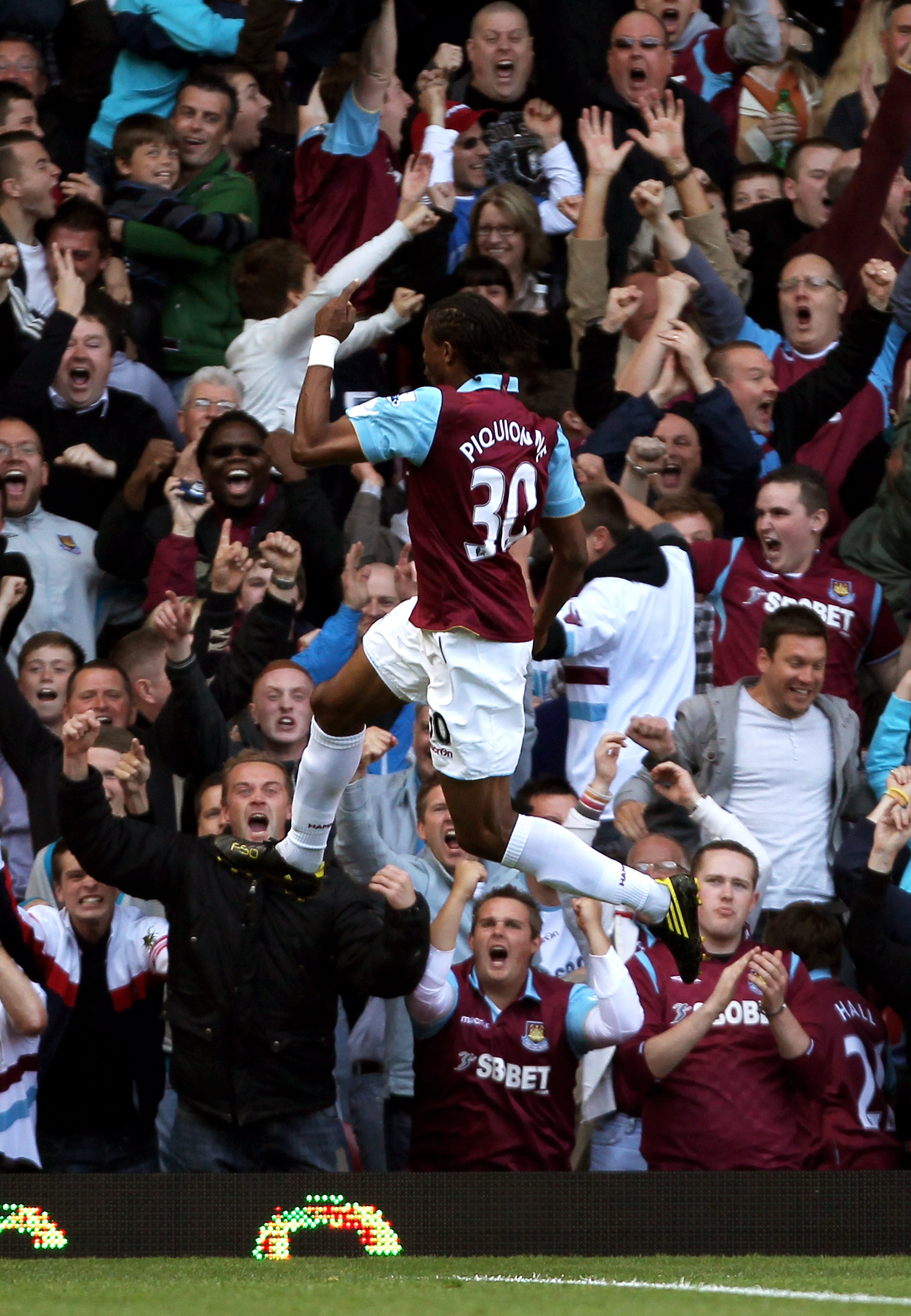 LONDON, ENGLAND - SEPTEMBER 25:  Frederic Piquionne of West Ham celebrates after scoring the opening goal during the Barclays Premier League match between West Ham United and Tottenham Hotspur at the Boleyn Ground on September 25, 2010 in London, England.