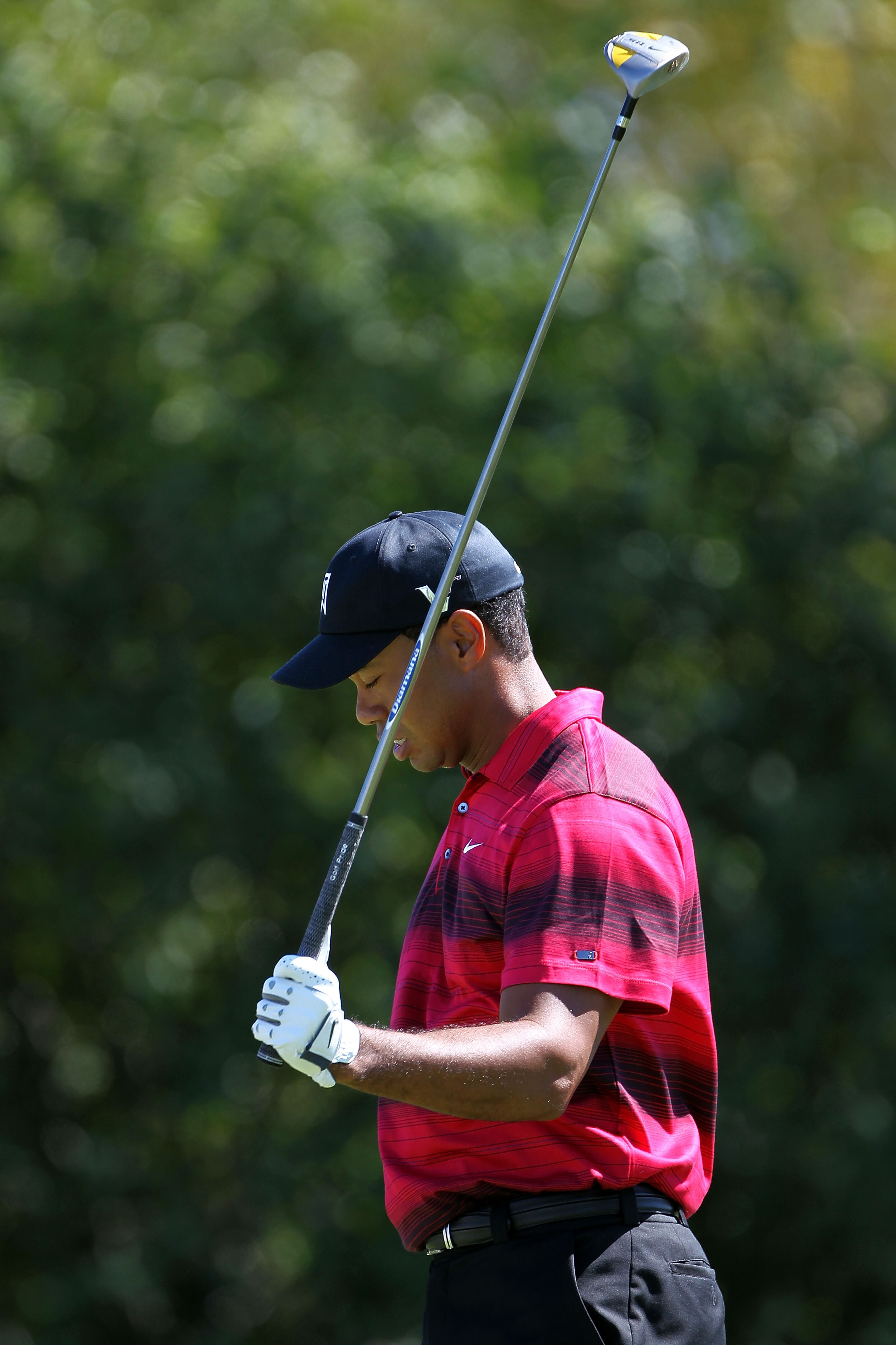 LEMONT, IL - SEPTEMBER 12:  Tiger Woods reacts from the fourth hole during the final round of the BMW Championship at Cog Hill Golf & Country Club on September 12, 2010 in Lemont, Illinois.  (Photo by Jamie Squire/Getty Images)