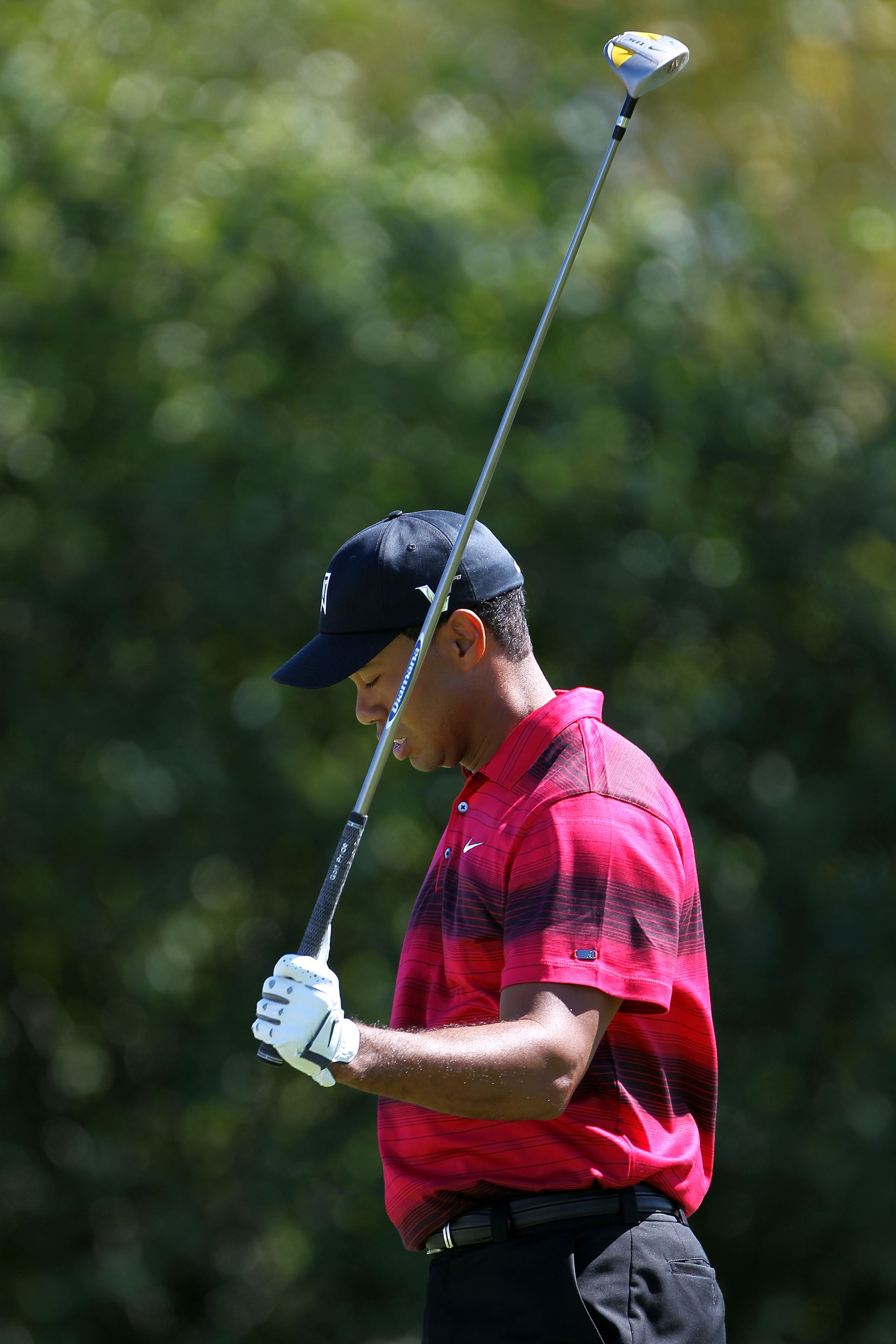 LEMONT, IL - SEPTEMBER 12:  Tiger Woods reacts from the fourth hole during the final round of the BMW Championship at Cog Hill Golf & Country Club on September 12, 2010 in Lemont, Illinois.  (Photo by Jamie Squire/Getty Images)