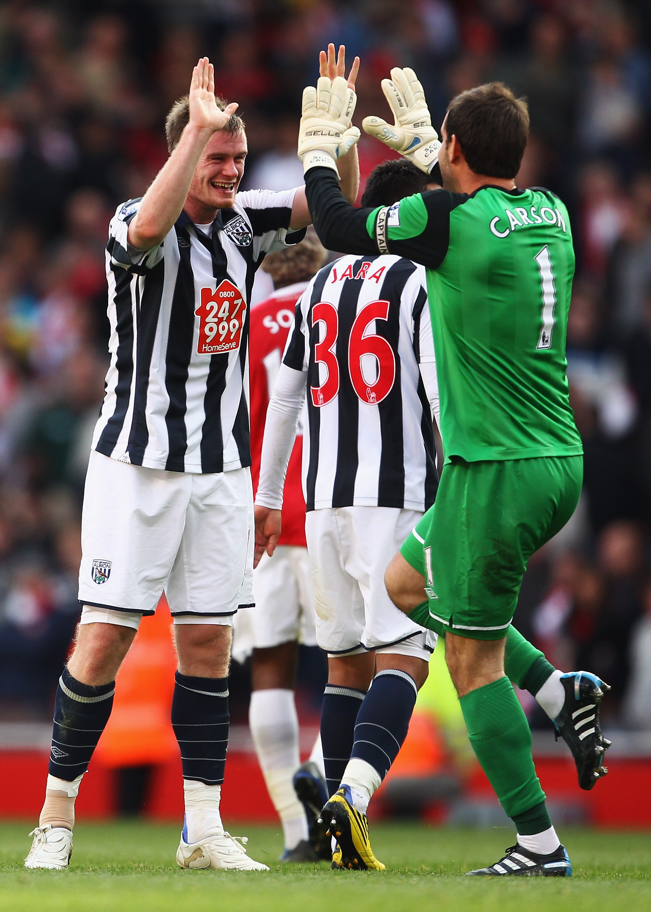 LONDON, ENGLAND - SEPTEMBER 25:  Chris Brunt (L) and Scott Carson of West Bromwich Albion celebrate victory after the Barclays Premier League match between Arsenal and West Bromwich Albion at the Emirates Stadium on September 25, 2010 in London, England.