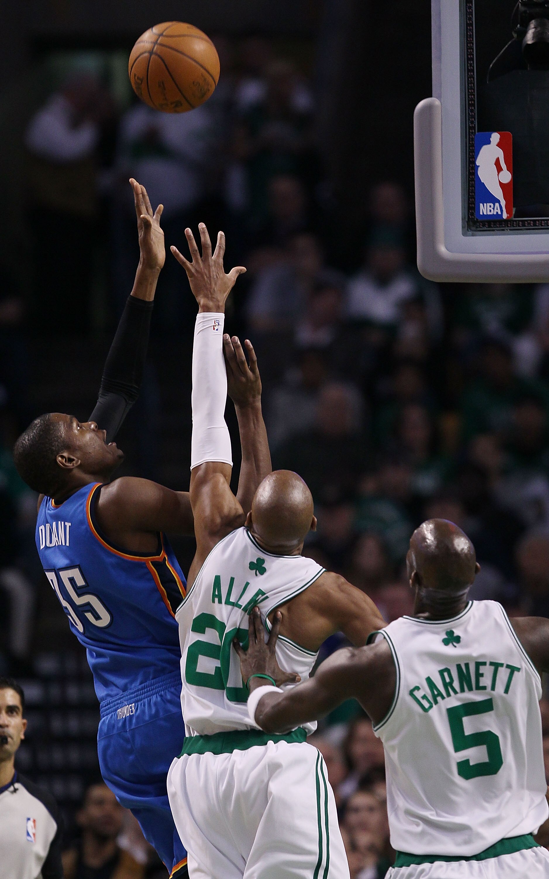 BOSTON - MARCH 31:  Kevin Durant #35 of the Oklahoma City Thunder goes up for the shot as Ray Allen #20 and Kevin Garnett #5 of the Boston Celtics  defend on March 31, 2010 at the TD Garden in Boston, Massachusetts.  NOTE TO USER: User expressly acknowled