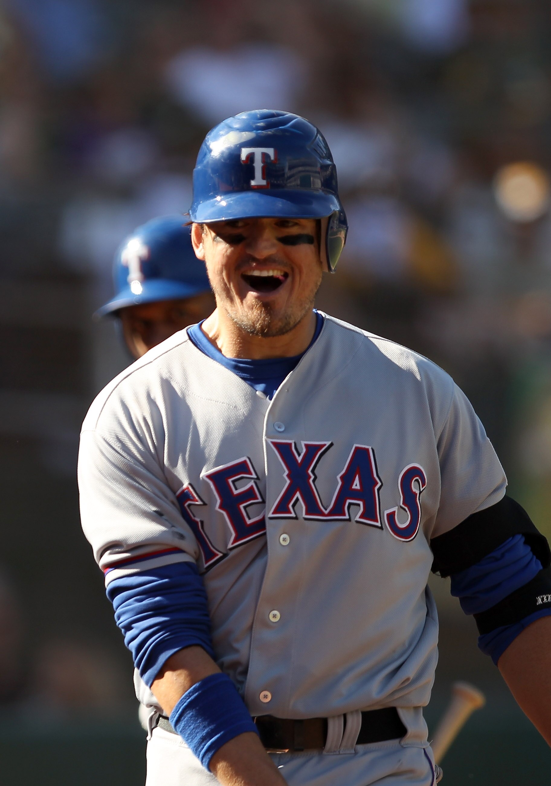 OAKLAND, CA - SEPTEMBER 25:  Jorge Cantu #8 of the Texas Rangers celebrates after he hit the game winning home run against the Oakland Athletics at the Oakland-Alameda County Coliseum on September 25, 2010 in Oakland, California. The Rangers clinched the