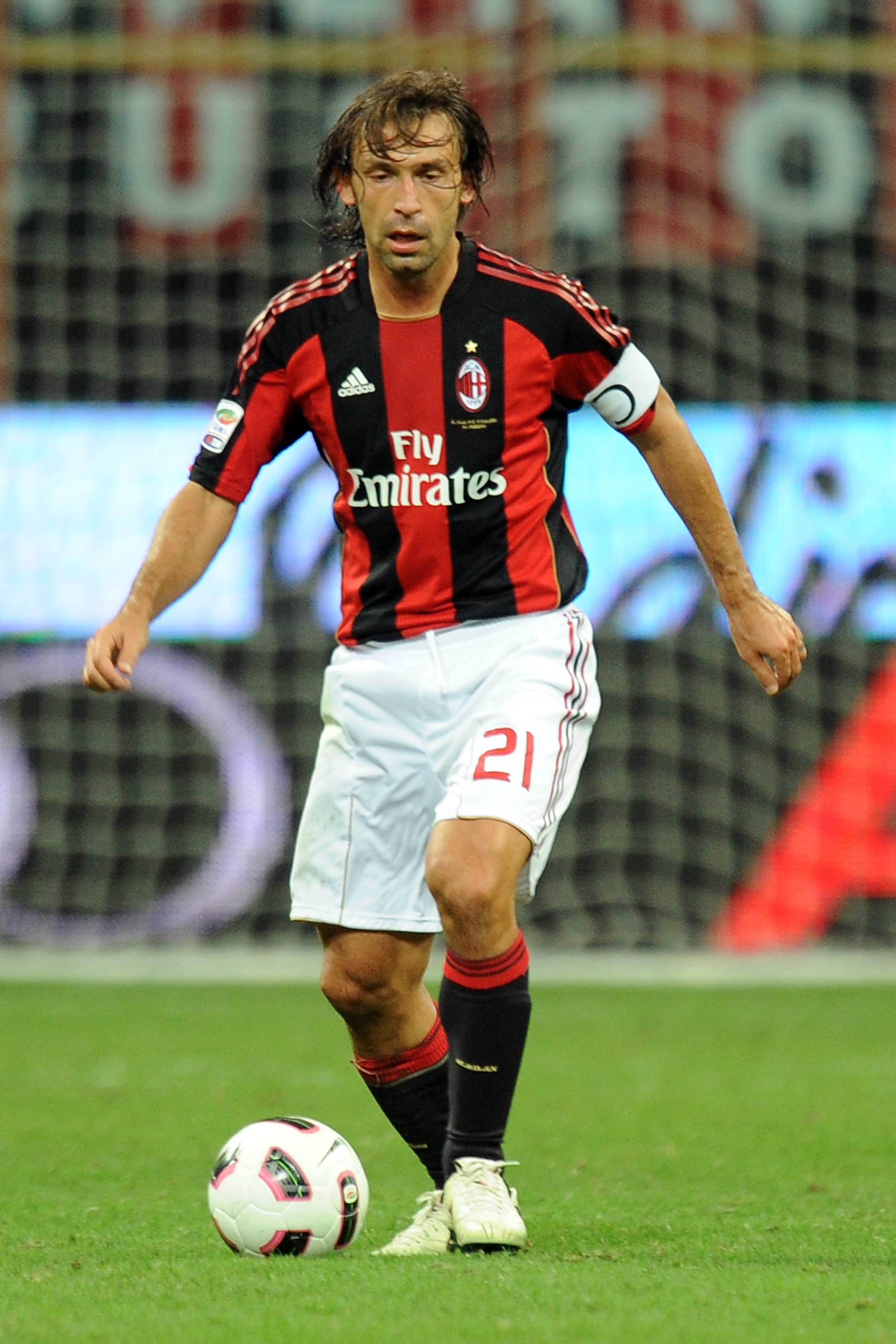 MILAN, ITALY - SEPTEMBER 26:  Andrea Pirlo of Milan in action during the Serie A match between AC Milan and Genoa CFC at Stadio Giuseppe Meazza on September 26, 2010 in Milan, Italy.  (Photo by Tullio M. Puglia/Getty Images)