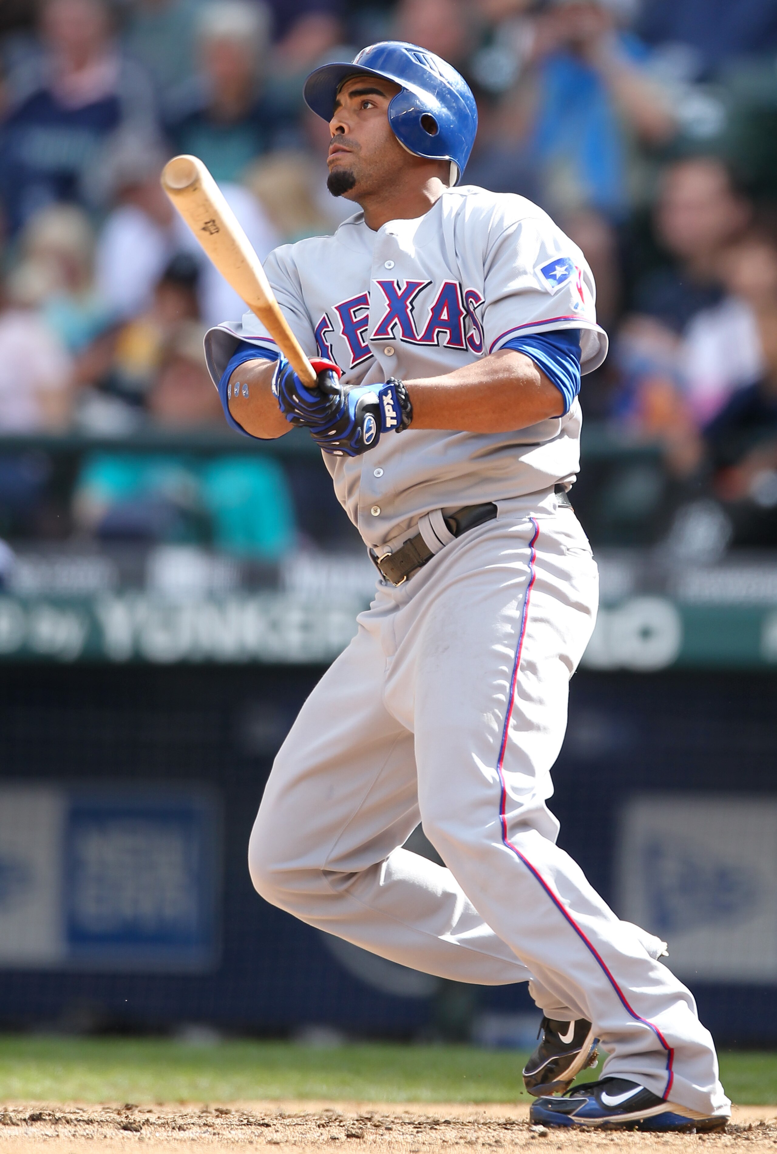 SEATTLE - SEPTEMBER 19:  Nelson Cruz #17 of the Texas Rangers watches the flight of his solo home run against the Seattle Mariners at Safeco Field on September 19, 2010 in Seattle, Washington. The Mariners defeated the Rangers 2-1. (Photo by Otto Greule J
