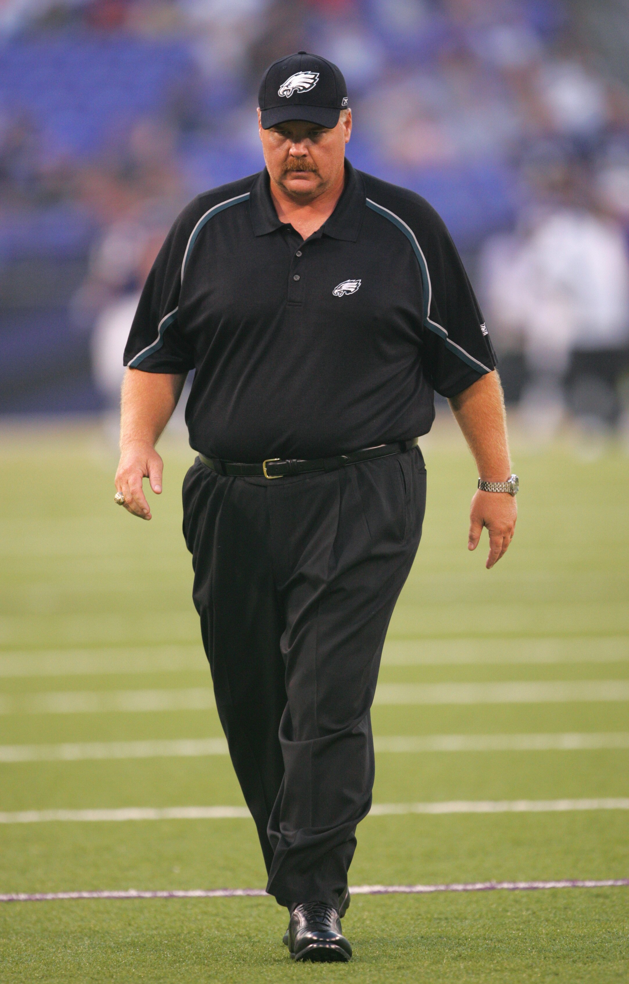 BALTIMORE, MD - AUGUST 20:  Head coach Andy Reid of the Philadelphia Eagles walks on the field before the preseason game against the Baltimore Ravens at M&T Bank Stadium on August 20, 2005 in Baltimore, Maryland.  (Photo By Jamie Squire/Getty Images)