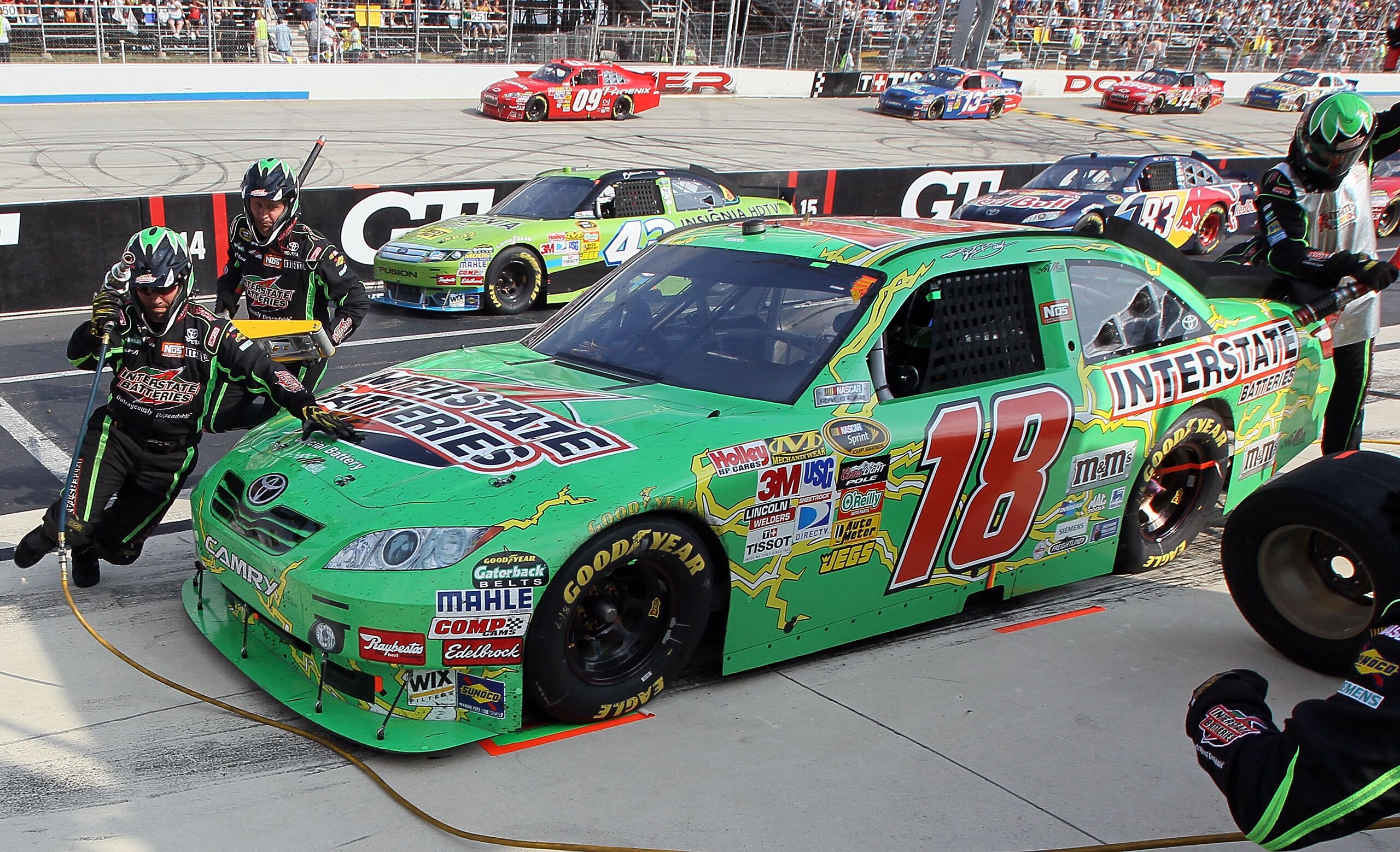 DOVER, DE - SEPTEMBER 26:  Kyle Busch, driver of the #18 Interstate Batteries Toyota, pits during the NASCAR Sprint Cup Series AAA 400 at Dover International Speedway on September 26, 2010 in Dover, Delaware.  (Photo by Jim McIsaac/Getty Images for NASCAR