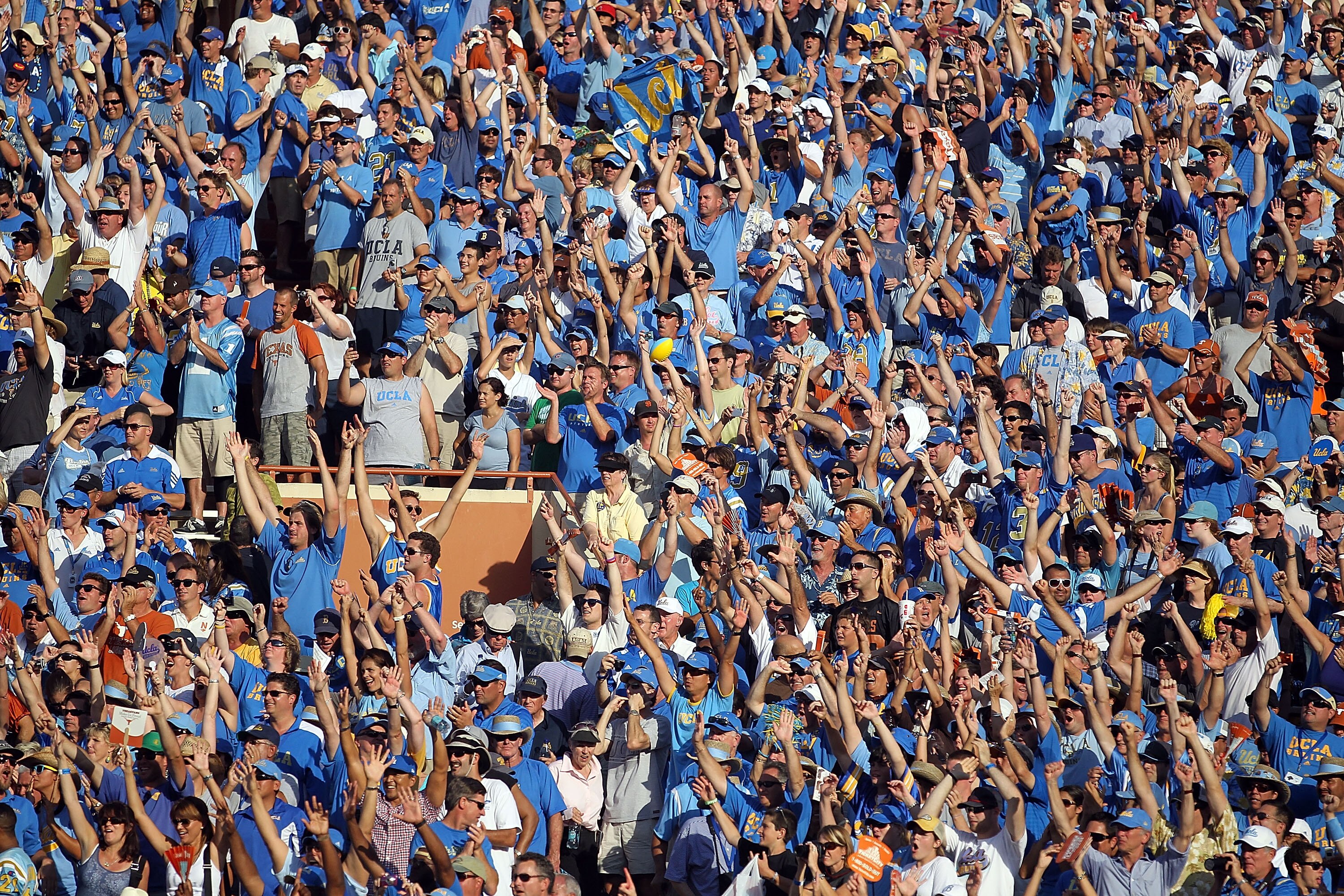 AUSTIN, TX - SEPTEMBER 25:  Fans of the UCLA Bruins cheer during a 34-12 win against the Texas Longhorns at Darrell K Royal-Texas Memorial Stadium on September 25, 2010 in Austin, Texas.  (Photo by Ronald Martinez/Getty Images)