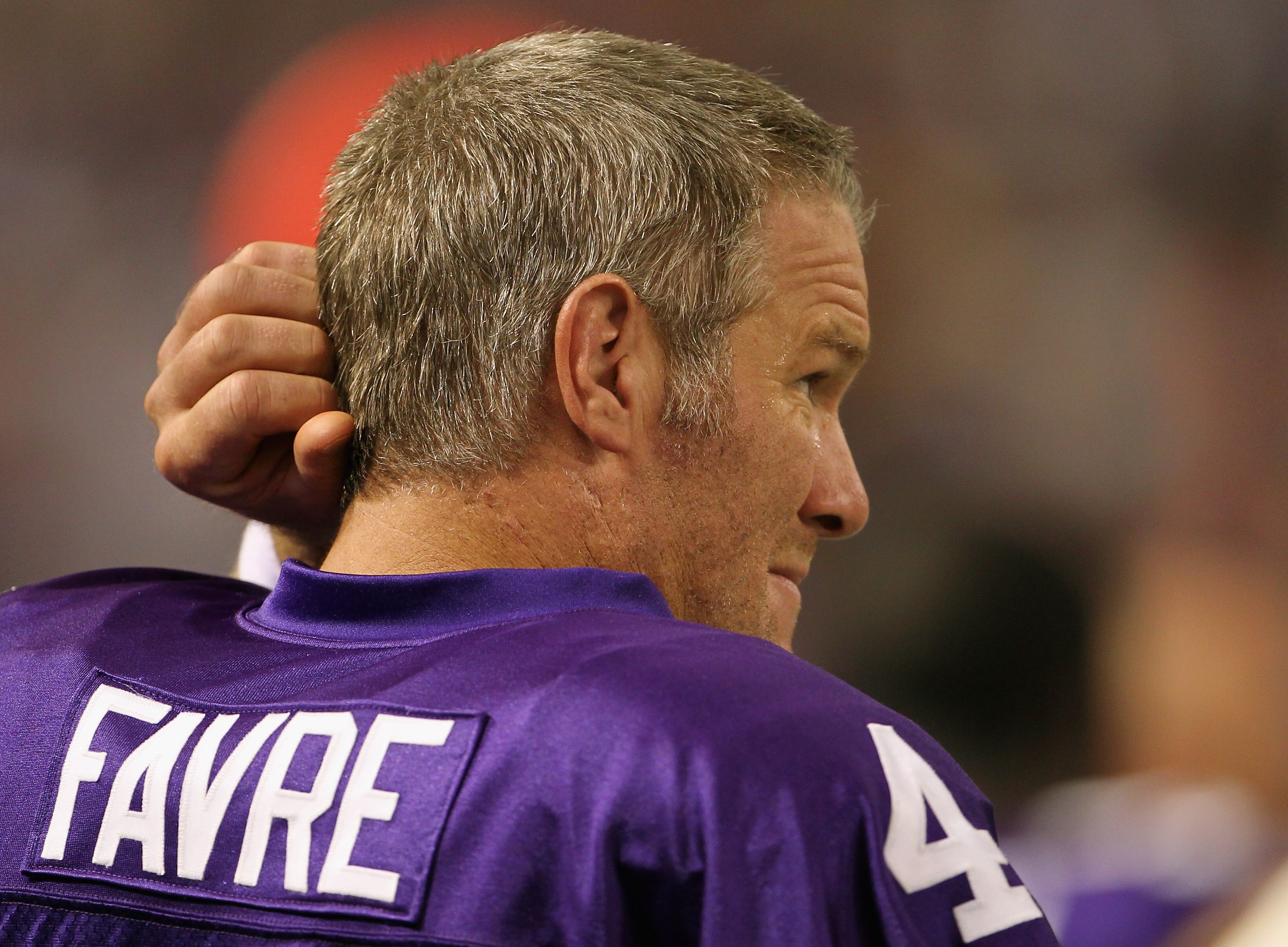 MINNEAPOLIS - SEPTEMBER 19:  Quarterback Brett Favre #4 of the Minnesota Vikings watches from the sidelines during the first half of the game against the Miami Dolphins on September 19, 2010 at Hubert H. Humphrey Metrodome in Minneapolis, Minnesota.  (Pho