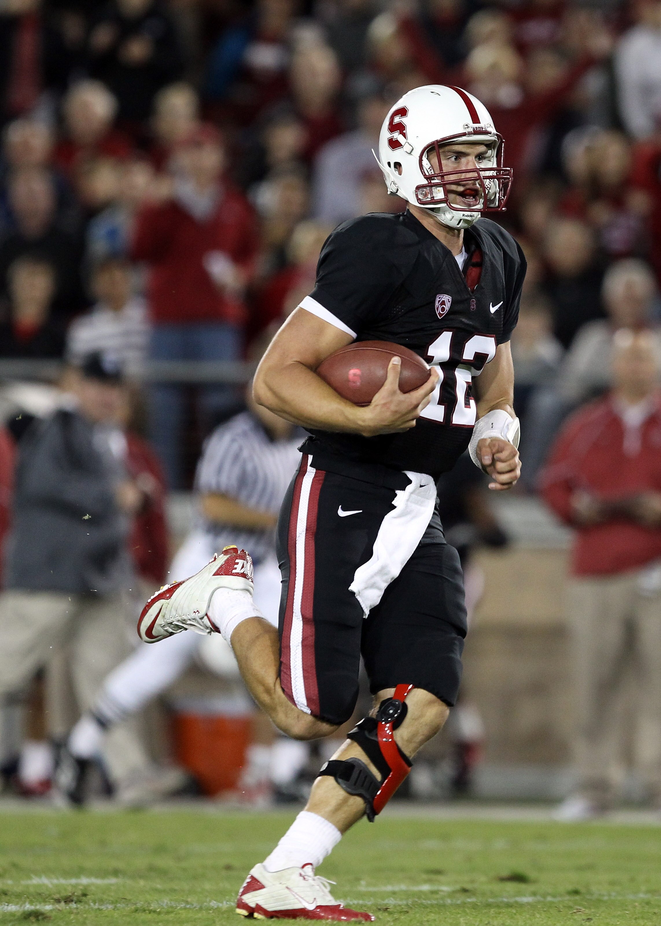 PALO ALTO, CA - SEPTEMBER 18:  Andrew Luck #12 of the Stanford Cardinal runs on his way to a touchdown against the Wake Forest Demon Deacons at Stanford Stadium on September 18, 2010 in Palo Alto, California.  (Photo by Ezra Shaw/Getty Images)
