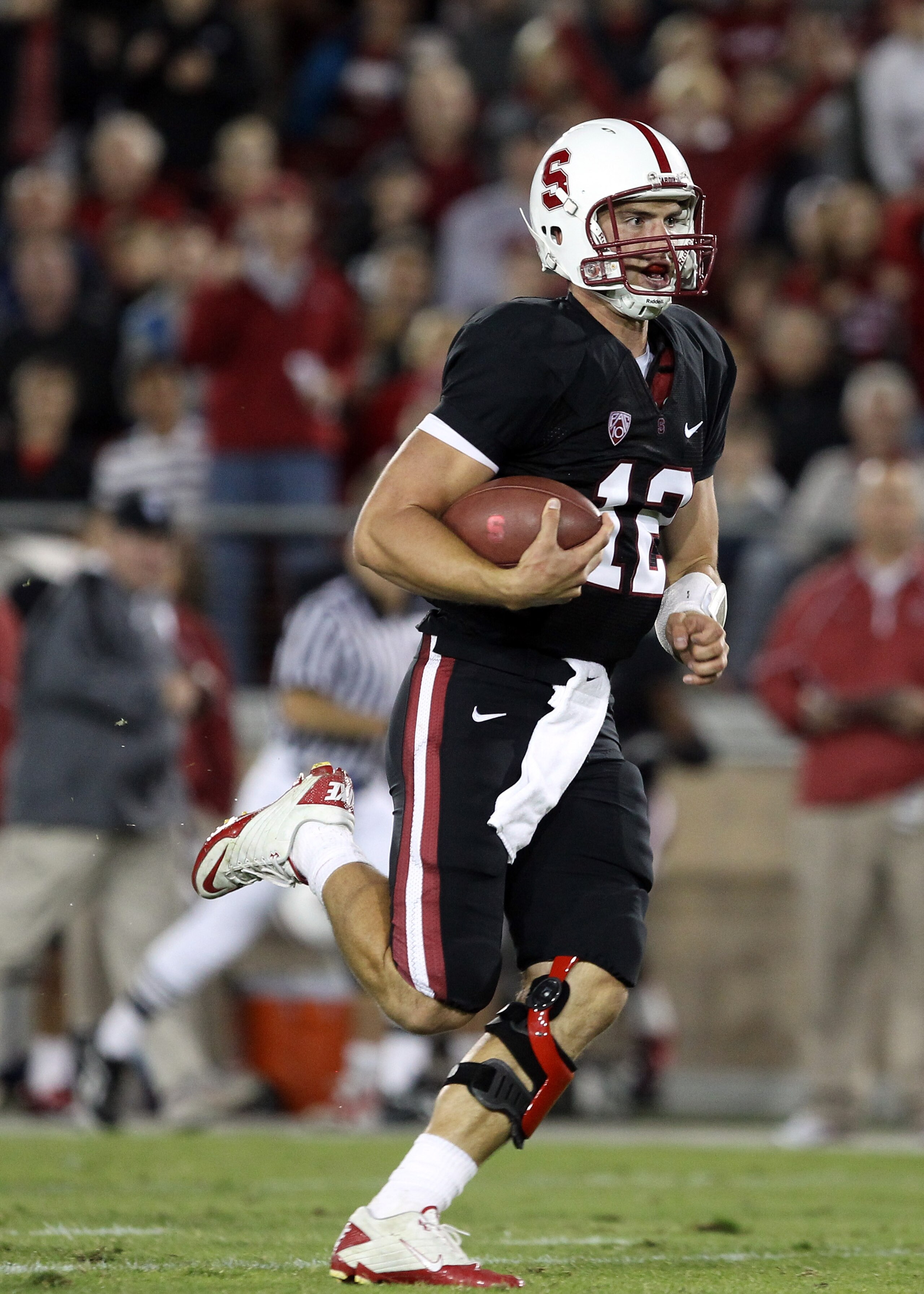 PALO ALTO, CA - SEPTEMBER 18:  Andrew Luck #12 of the Stanford Cardinal runs on his way to a touchdown against the Wake Forest Demon Deacons at Stanford Stadium on September 18, 2010 in Palo Alto, California.  (Photo by Ezra Shaw/Getty Images)