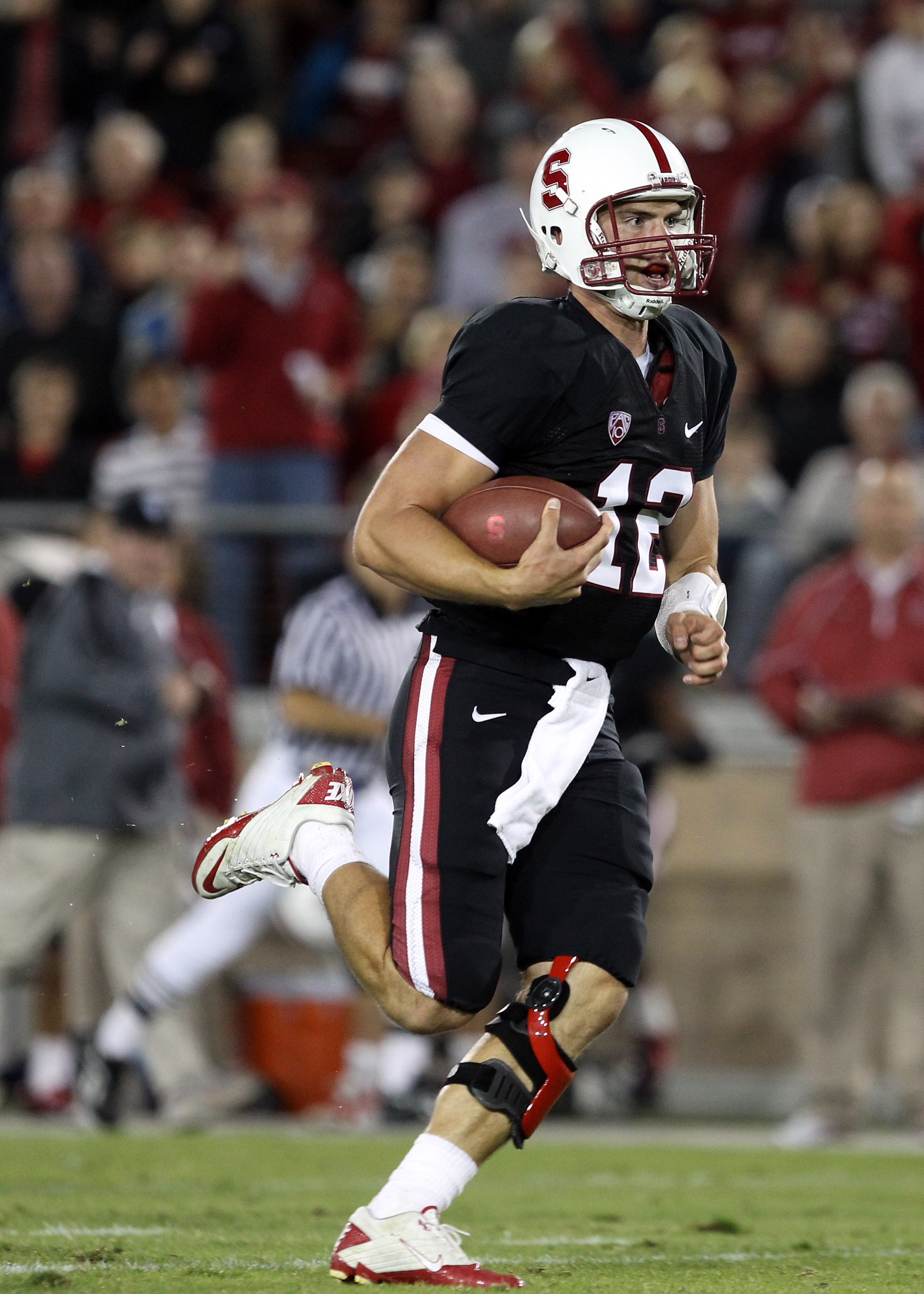 PALO ALTO, CA - SEPTEMBER 18:  Andrew Luck #12 of the Stanford Cardinal runs on his way to a touchdown against the Wake Forest Demon Deacons at Stanford Stadium on September 18, 2010 in Palo Alto, California.  (Photo by Ezra Shaw/Getty Images)