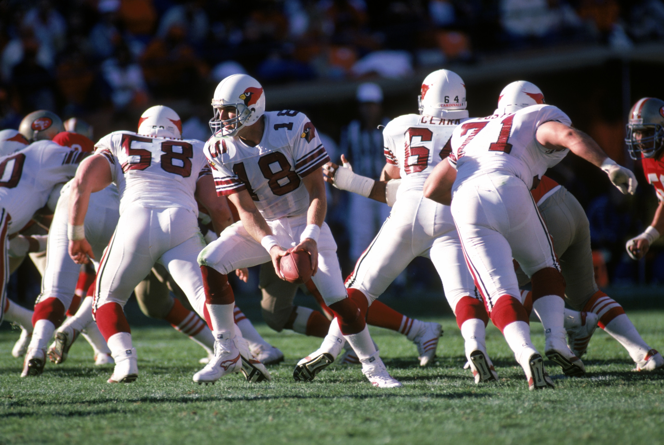 SAN FRANCISCO - NOVEMBER 9:  Quarterback Cliff Stoudt #18 of the St. Louis Cardinals runs a play during a game against the San Francisco 49ers at Candlestick Park on November 9, 1986 in San Francisco, California.  The 49ers won 43-17.  (Photo by George Ro