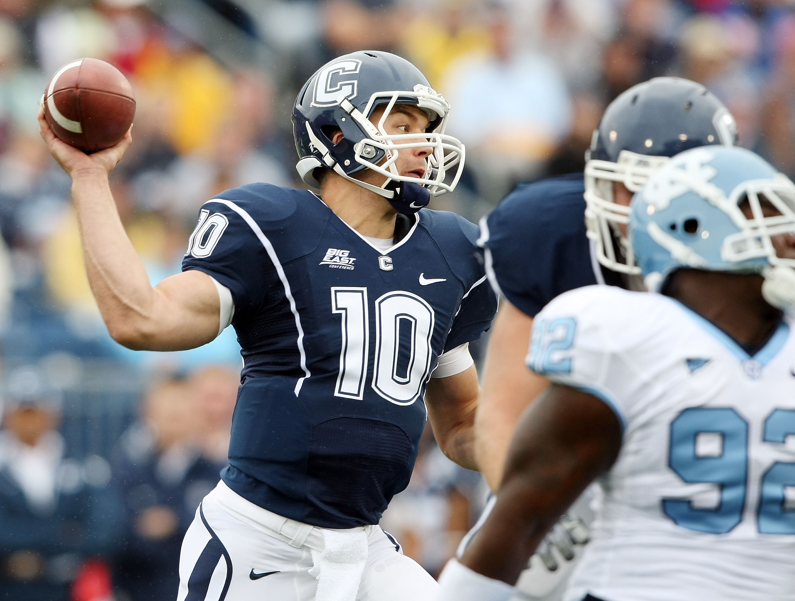 EAST HARTFORD, CT - SEPTEMBER 12:  Zach Frazer #10 of the Connecticut Huskies tries to pass the ball in the first quarter against the North Carolinia Tar Heels on September 12, 2009 at Rentschler Field in East Hartford, Connecticut.  (Photo by Elsa/Getty 
