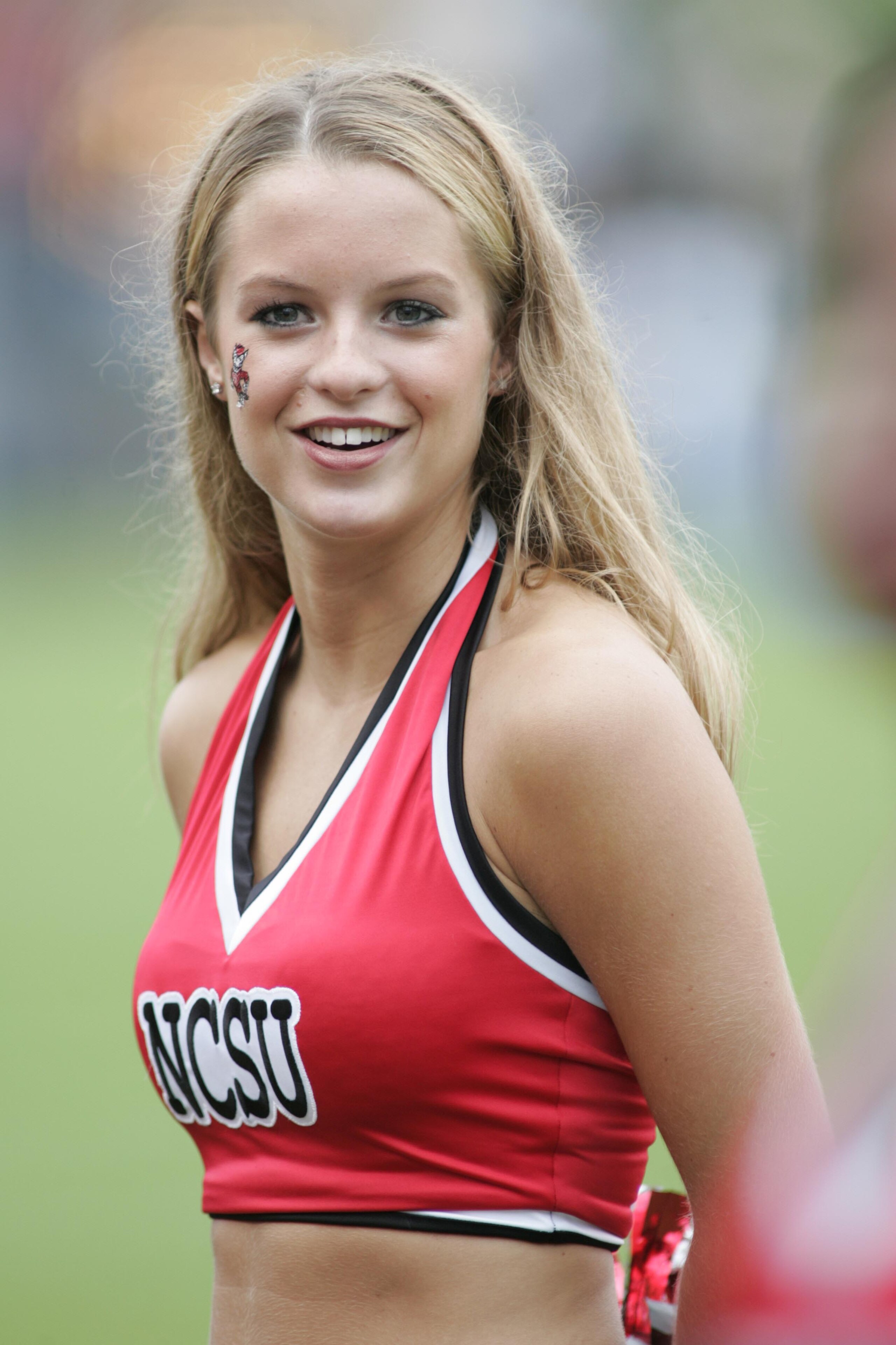 RALEIGH, NC - SEPTEMBER 18: A North Carolina State Wolfpack cheerleader is seen during the game against the Ohio State Buckeyes on September 18, 2004 at Carter-Finley Stadium Stadium in Raleigh, North Carolina. (Photo by Grant Halverson/Getty Images) RALEIGH, NC - SEPTEMBER 18: A North Carolina State Wolfpack cheerleader is seen during the game against the Ohio State Buckeyes on September 18, 2004 at Carter-Finley Stadium Stadium in Raleigh, North Carolina. (Photo by Grant Halverson/Getty Images)