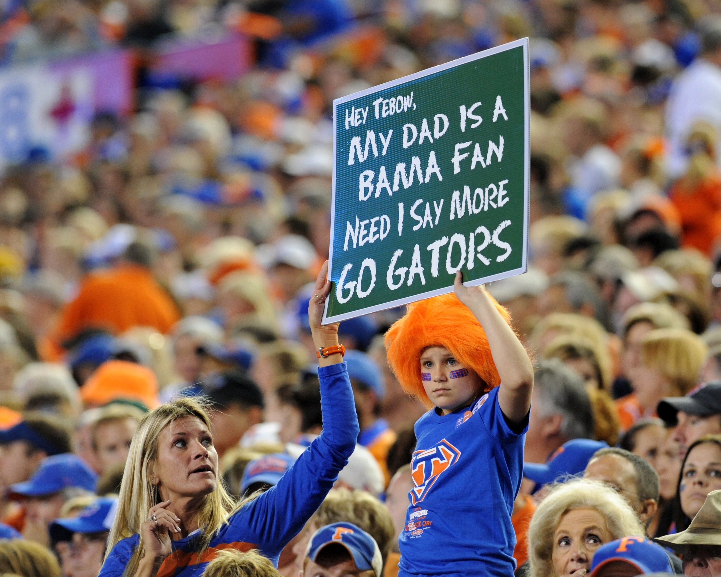 GAINESVILLE, FL - NOVEMBER 7: Fans of the Florida Gators cheer play against the Vanderbilt Commodores with a comment about the Alabama Crimson Tide on November 7, 2009 at Ben Hill Griffin Stadium in Gainesville, Florida.  (Photo by Al Messerschmidt/Getty