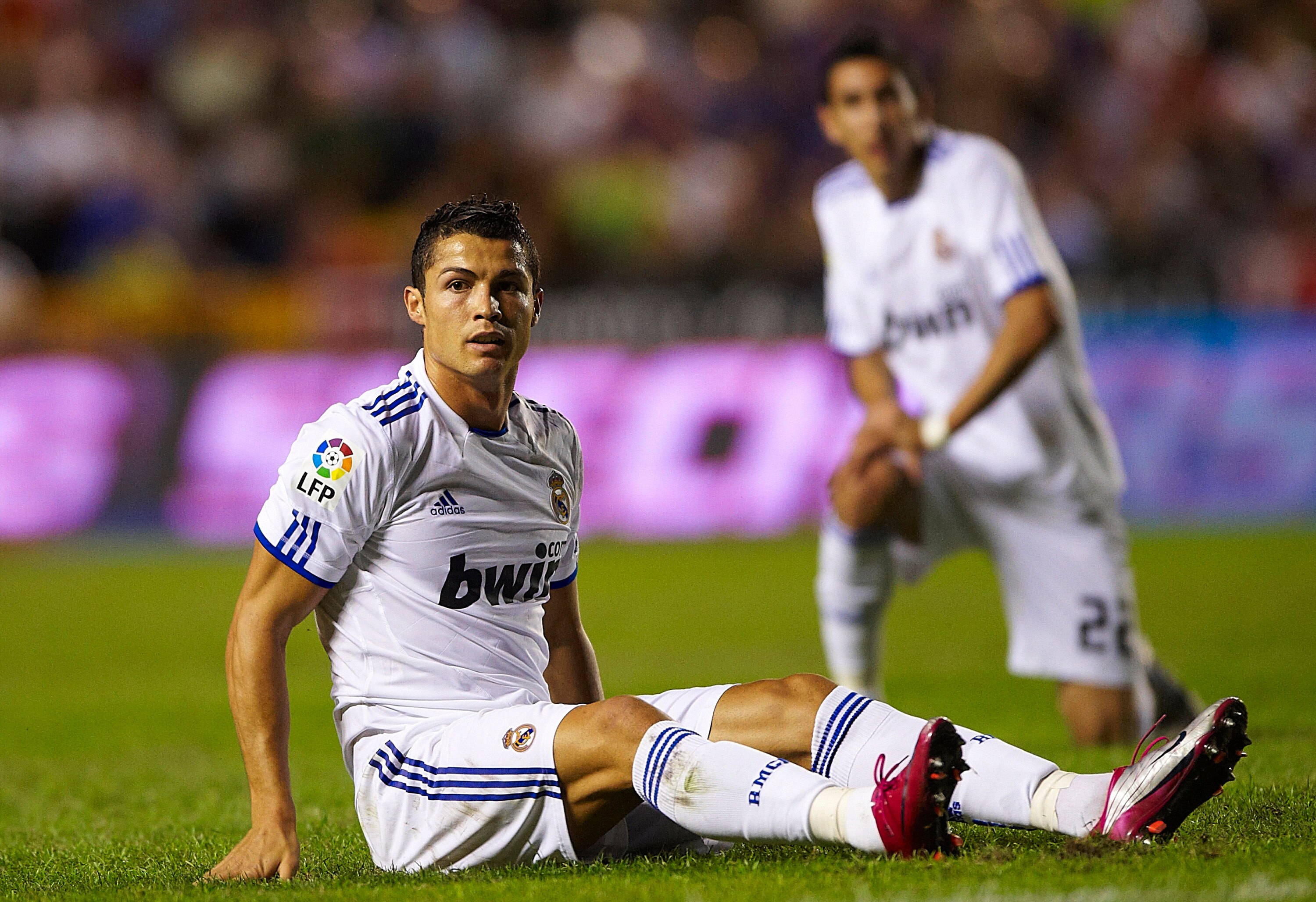 VALENCIA, SPAIN - SEPTEMBER 25:  Cristiano Ronaldo of Real Madrid falls during the La Liga match between Levante UD and Real Madrid at Ciutat de Valencia on September 25, 2010 in Valencia, Spain. The match ended in a 0-0 draw.  (Photo by Manuel Queimadelo