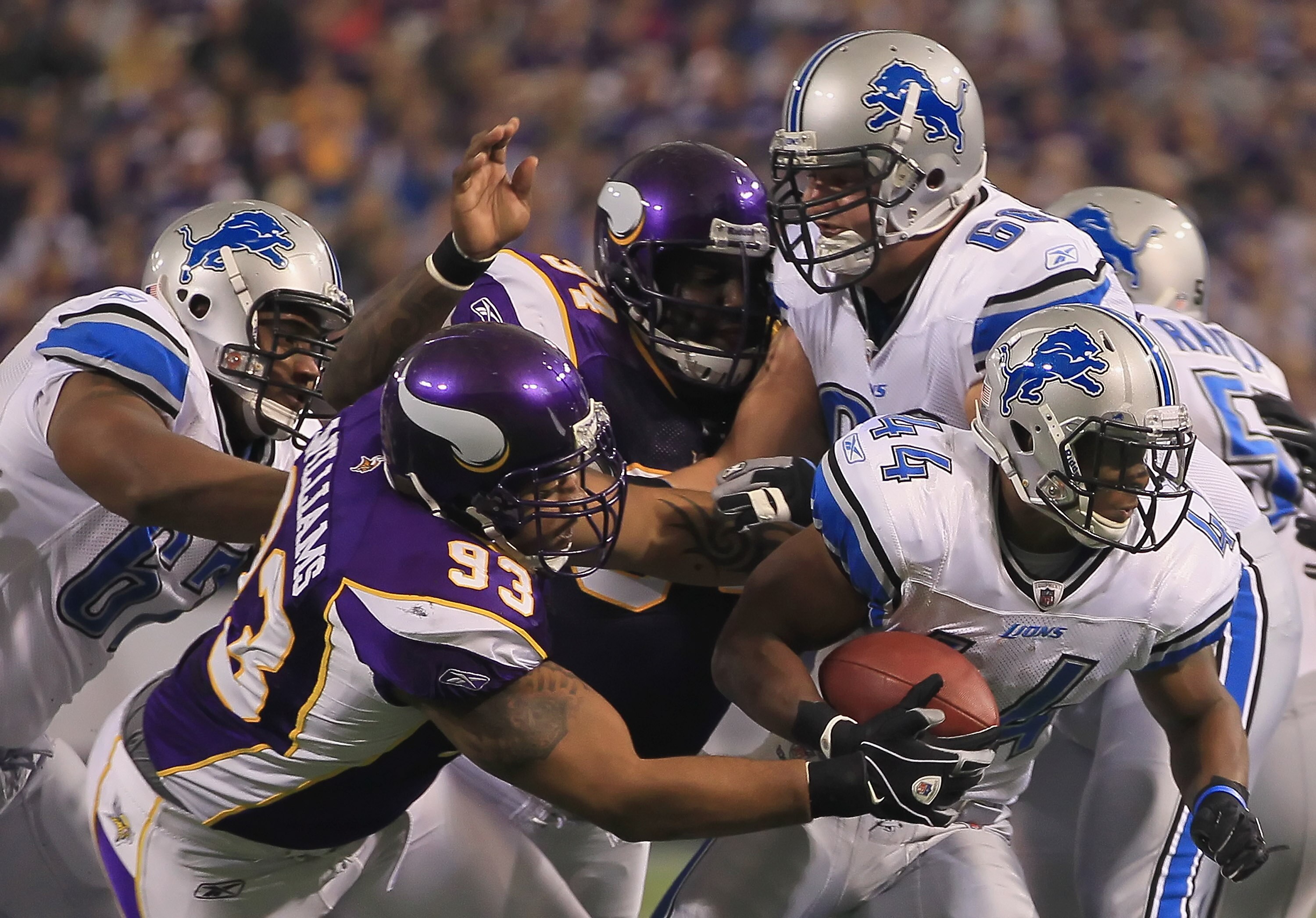 MINNEAPOLIS - SEPTEMBER 26:  Running back Jahvid Best #44 of the Detroit Lions is pursued by Kevin Williams #93 of the Minnesota Vikings during the first half at Hubert H. Humphrey Metrodome on September 26, 2010 in Minneapolis, Minnesota. The Vikings def