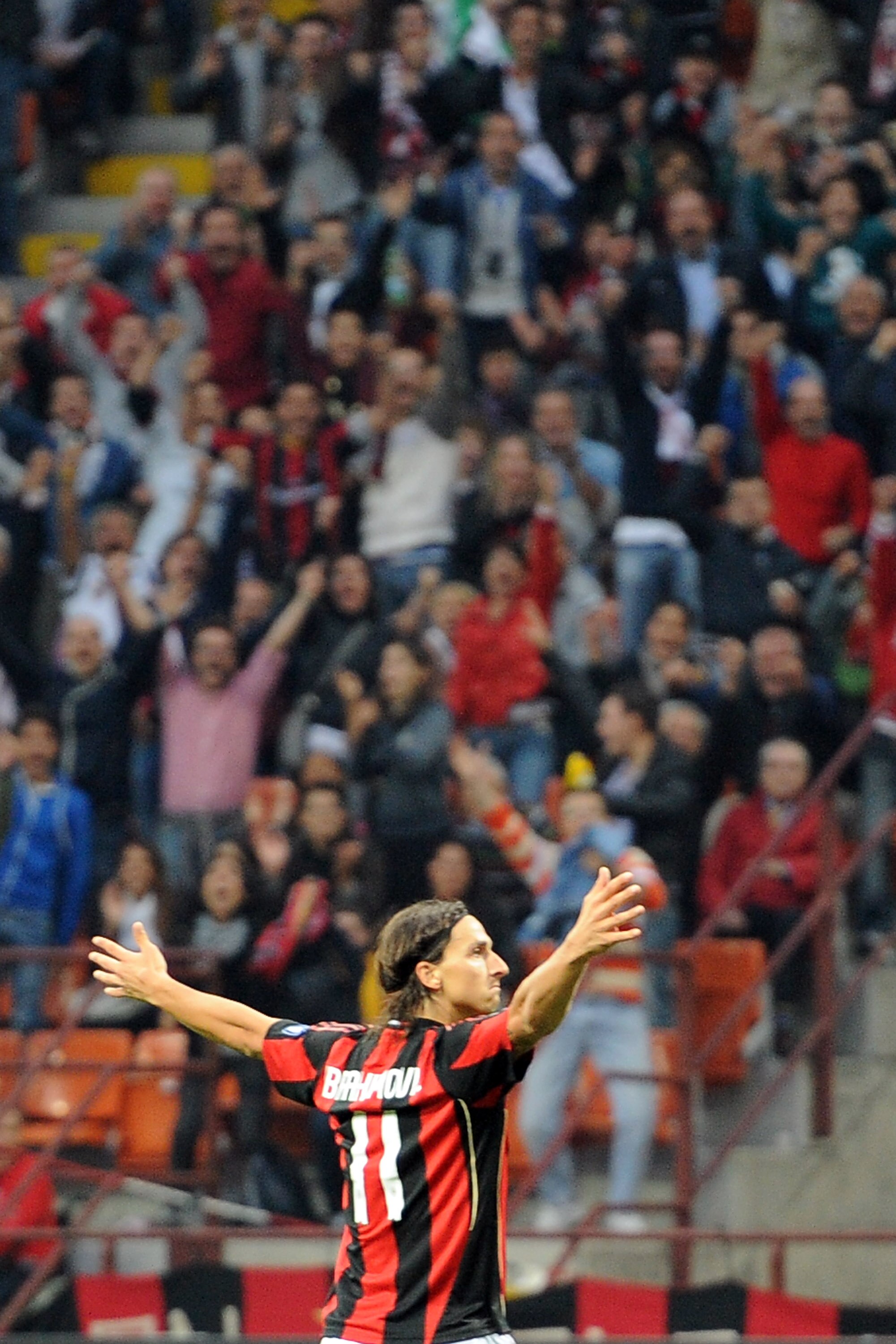 MILAN, ITALY - SEPTEMBER 25:  Zlatan Ibrahimovic of Milan celebrates the opening goal during the Serie A match between AC Milan and Genoa CFC at Stadio Giuseppe Meazza on September 25, 2010 in Milan, Italy.  (Photo by Tullio M. Puglia/Getty Images)