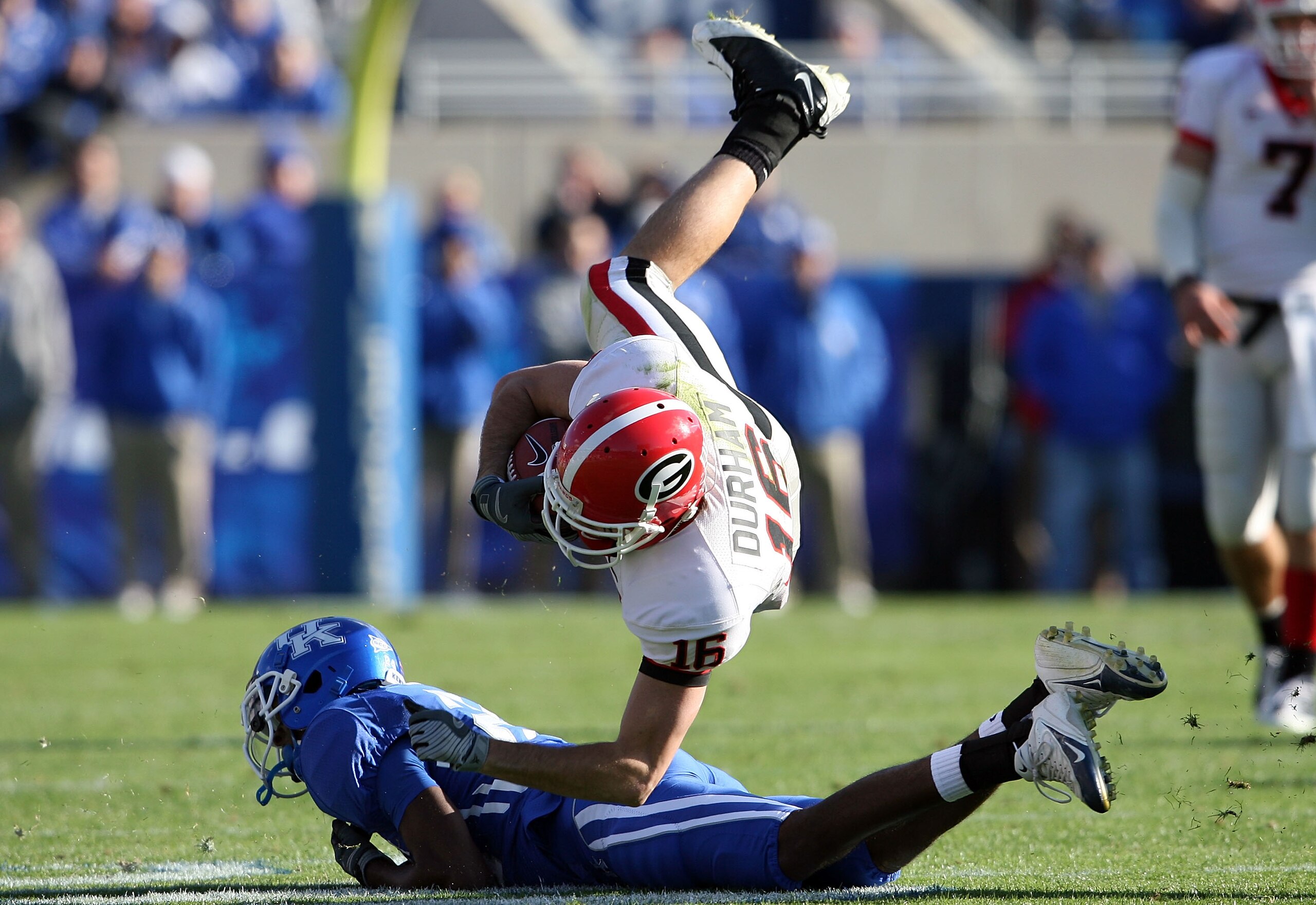 LEXINGTON, KY - NOVEMBER 08: Kris Durham #16 of the Georgia Bulldogs is tripped up during the game against the Kentucky Wildcats at Commonwealth Stadium on November 8, 2008 in Lexington, Kentucky.  (Photo by Andy Lyons/Getty Images)