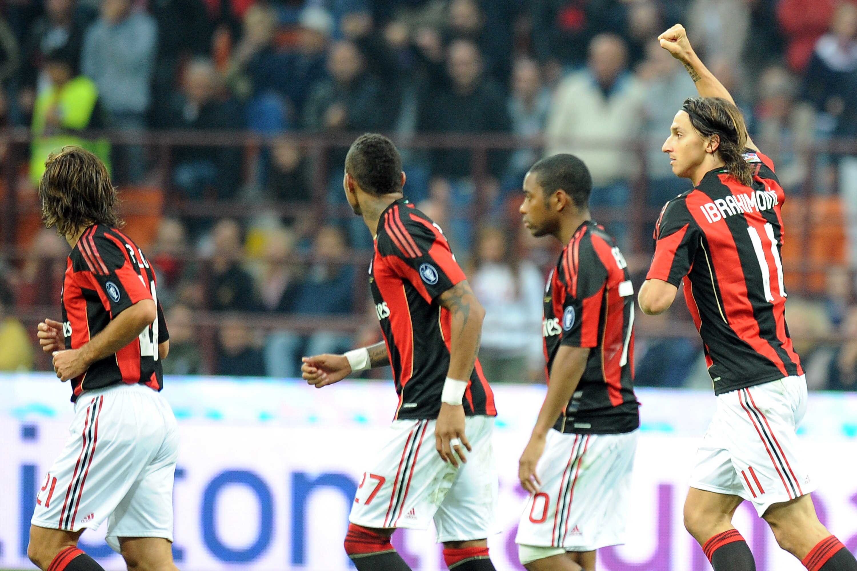 MILAN, ITALY - SEPTEMBER 26:  Zlatan Ibrahimovic (R) of Milan celebrates the opening goal during the Serie A match between AC Milan and Genoa CFC at Stadio Giuseppe Meazza on September 26, 2010 in Milan, Italy.  (Photo by Tullio M. Puglia/Getty Images)
