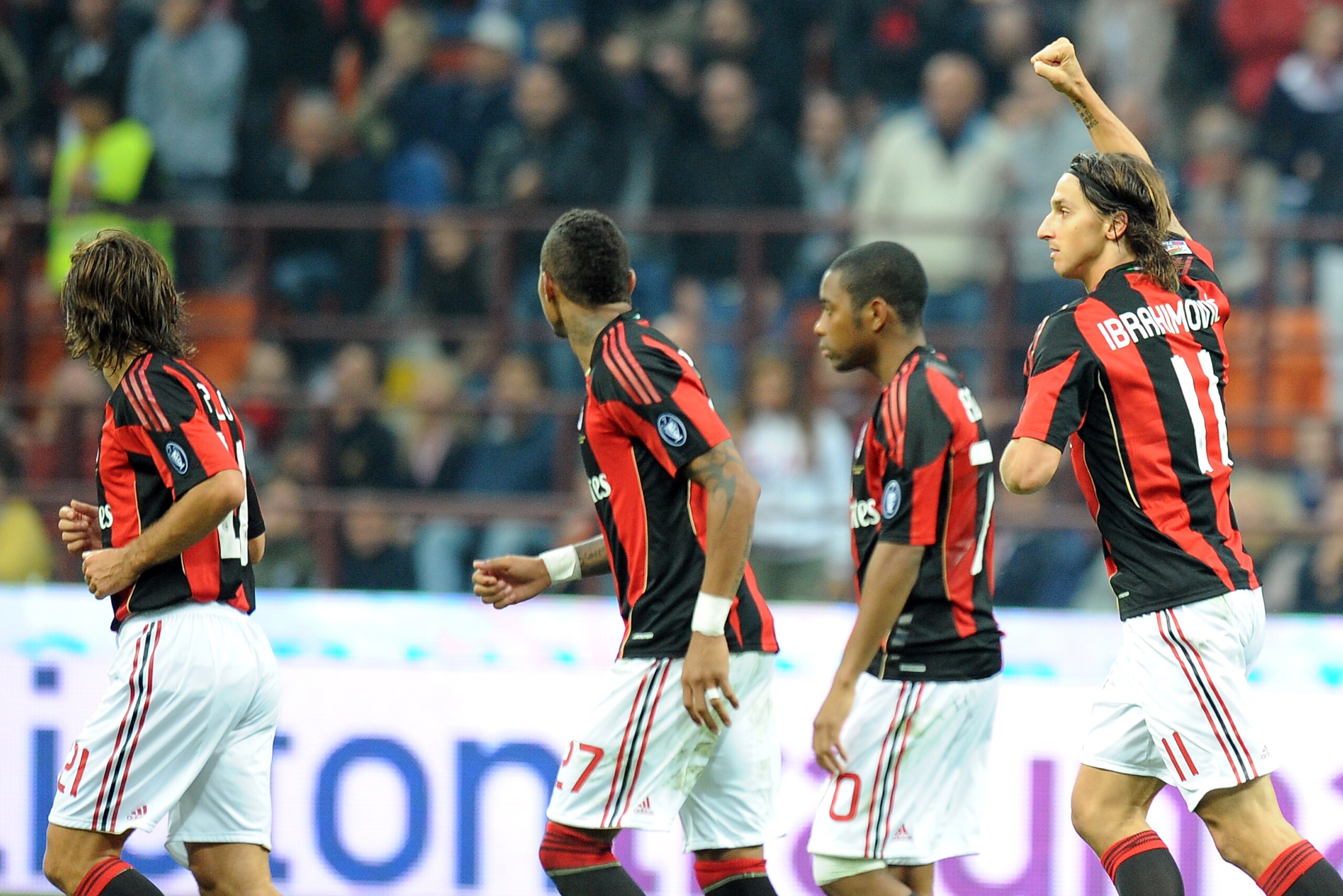 MILAN, ITALY - SEPTEMBER 26:  Zlatan Ibrahimovic (R) of Milan celebrates the opening goal during the Serie A match between AC Milan and Genoa CFC at Stadio Giuseppe Meazza on September 26, 2010 in Milan, Italy.  (Photo by Tullio M. Puglia/Getty Images)