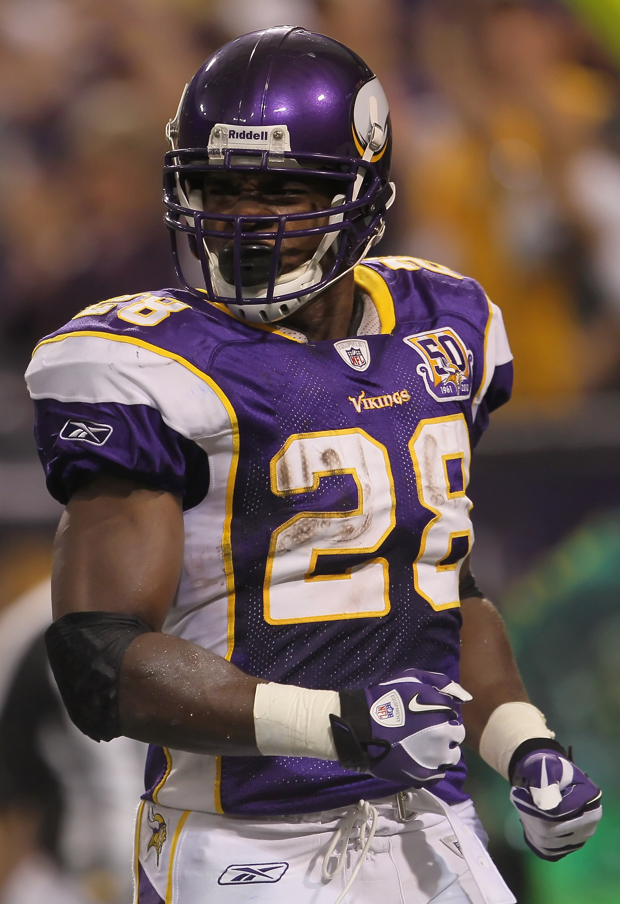 MINNEAPOLIS - SEPTEMBER 26:  Running back Adrian Peterson #28 of the Minnesota Vikings celebrates a touchdown during the second half against the Detroit Lions at Hubert H. Humphrey Metrodome on September 26, 2010 in Minneapolis, Minnesota. The Vikings def