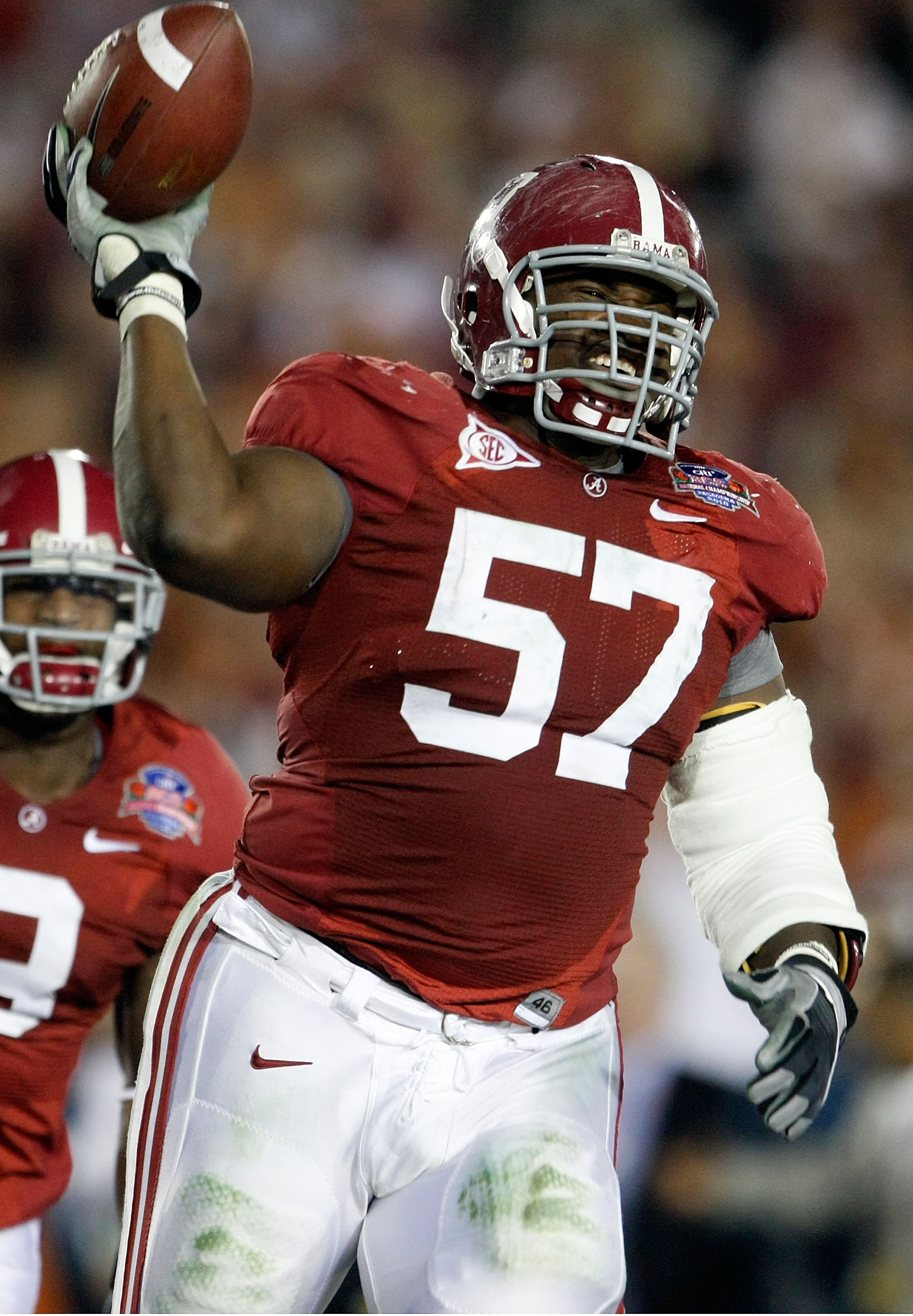 PASADENA, CA - JANUARY 07:  Lineman Marcell Dareus #57 of the Alabama Crimson Tide celebrates after an interception returned for a touchdown against the Texas Longhorns during the second quarter of the Citi BCS National Championship game at the Rose Bowl 