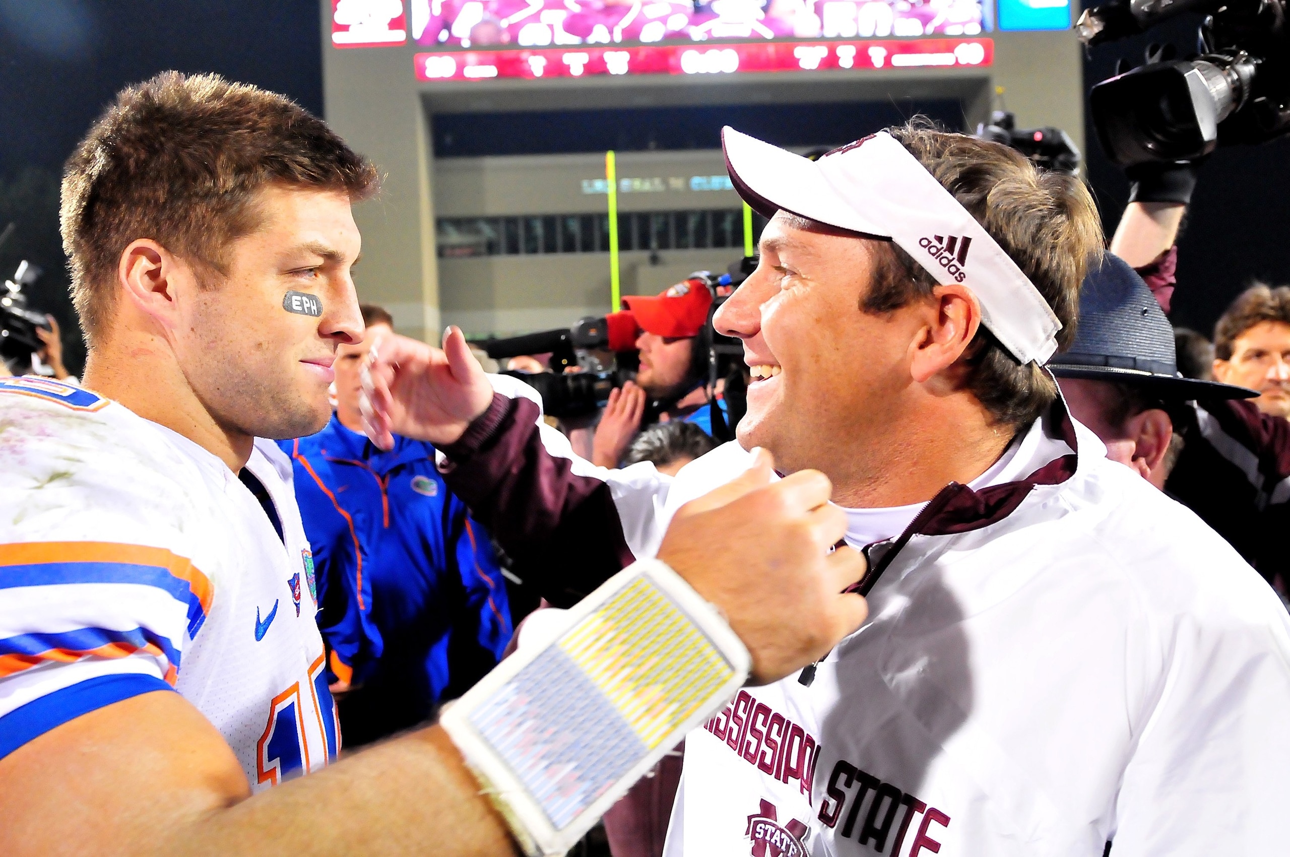 STARKVILLE, MS - OCTOBER 24: Quarterback Tim Tebow # 15 of the Florida Gators and Mississippi State Bulldogs head coach Dan Mullen greet one another following the game, at Davis Wade Stadium on October 24, 2009 in Starkville, Mississippi (Photo by Rick STARKVILLE, MS - OCTOBER 24: Quarterback Tim Tebow # 15 of the Florida Gators and Mississippi State Bulldogs head coach Dan Mullen greet one another following the game, at Davis Wade Stadium on October 24, 2009 in Starkville, Mississippi (Photo by Rick