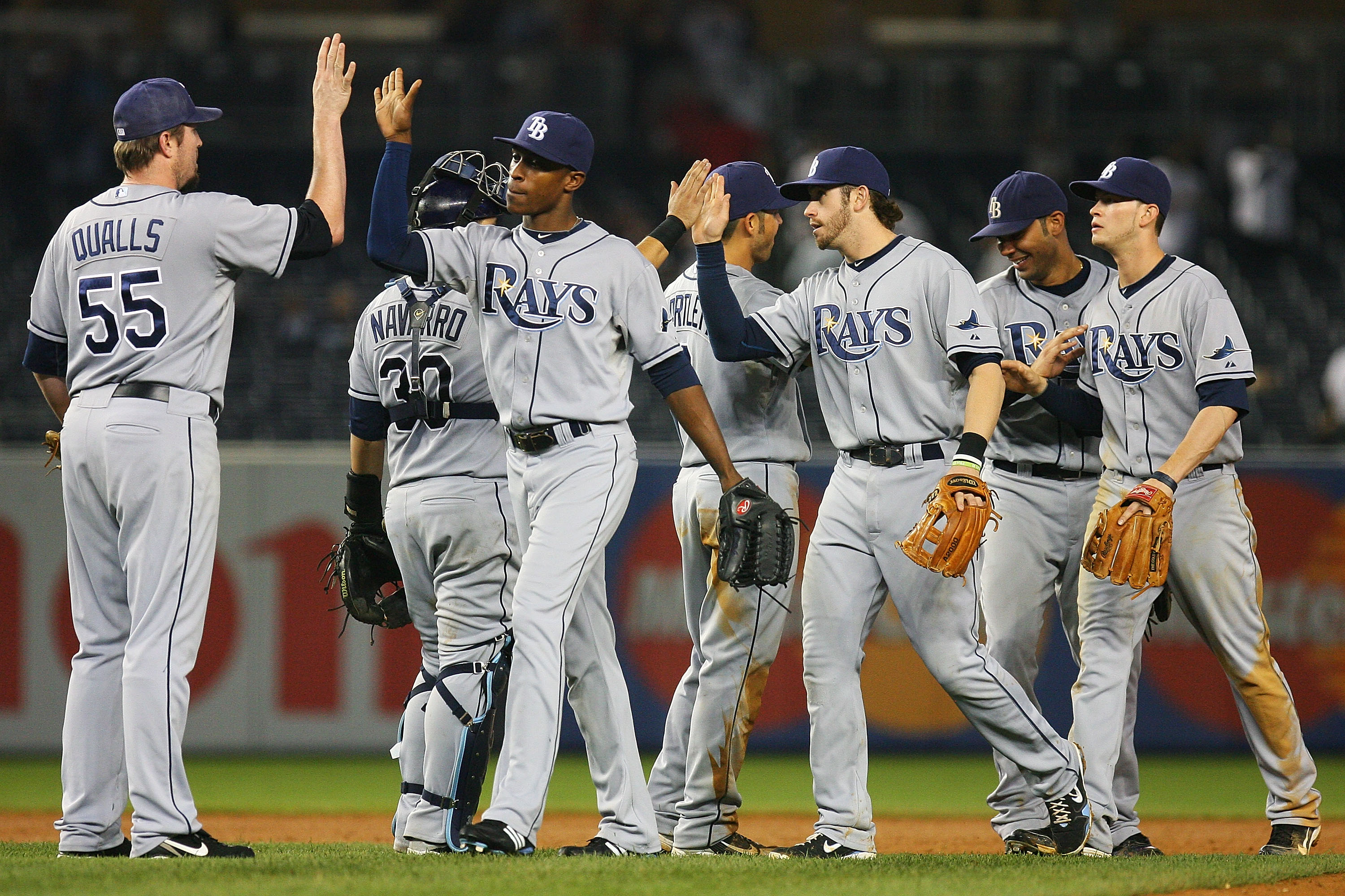 NEW YORK - SEPTEMBER 22:  The Tampa Bay Rays celebrate after defeating the New York Yankees 7 - 2 on September 22, 2010 at Yankee Stadium in the Bronx borough of New York City.  (Photo by Andrew Burton/Getty Images)