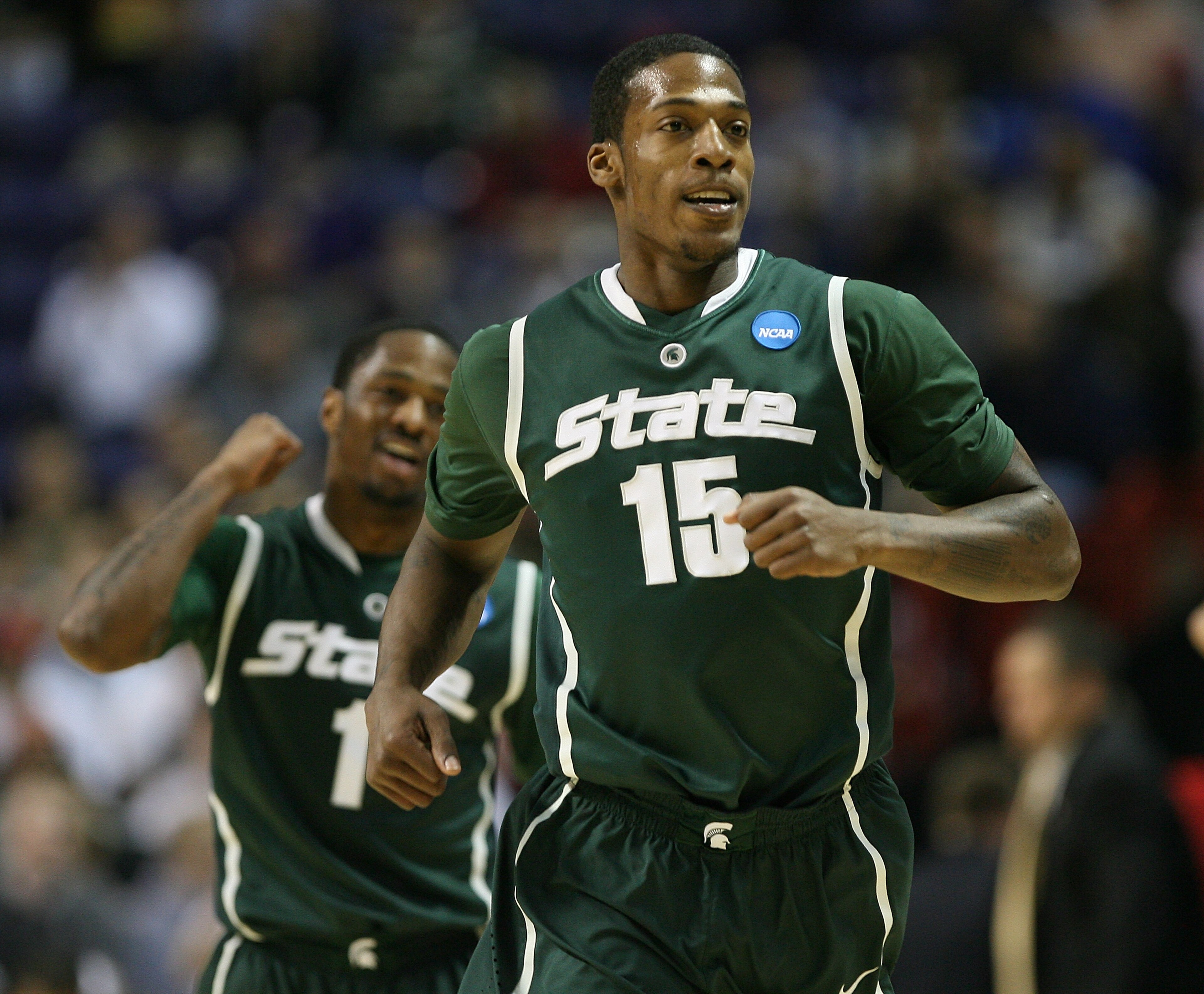 SPOKANE, WA - MARCH 21:  Durrell Summers #15 of the Michigan State Spartans and Kalin Lucas #1 celebrate their 85-83 win against the Maryland Terrapins during the second round of the 2010 NCAA men's basketball tournament at the Spokane Arena on March 21,