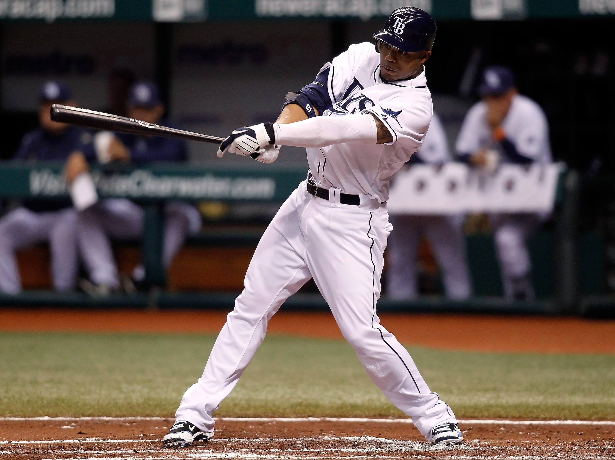 ST. PETERSBURG, FL - SEPTEMBER 15:  Outfielder Carl Crawford #13 of the Tampa Bay Rays fouls off a pitch against the New York Yankees during the game at Tropicana Field on September 15, 2010 in St. Petersburg, Florida.  (Photo by J. Meric/Getty Images)