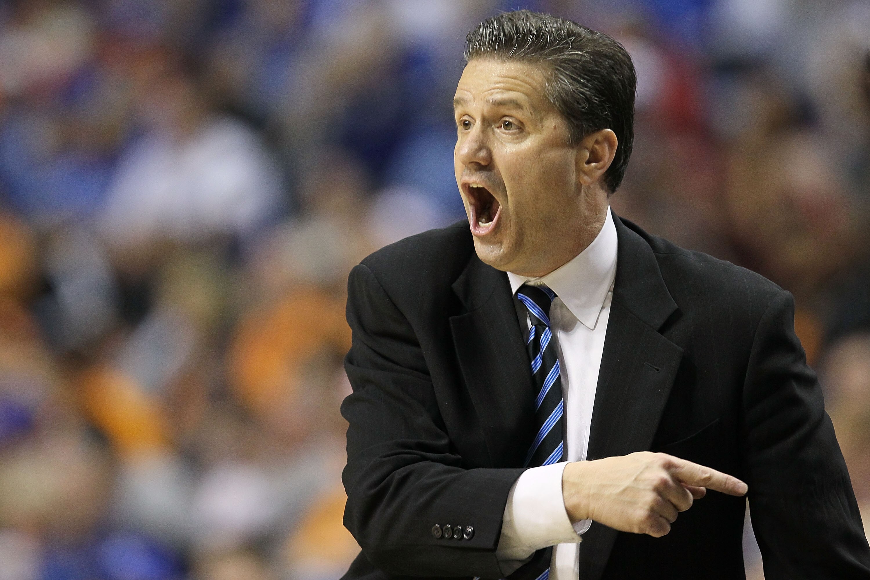 NASHVILLE, TN - MARCH 12:  Head coach John Calipari of the Kentucky Wildcats reacts as he coaches against the Alabama Crimson Tide during the quarterfinals of the SEC Men's Basketball Tournament at the Bridgestone Arena on March 12, 2010 in Nashville, Ten