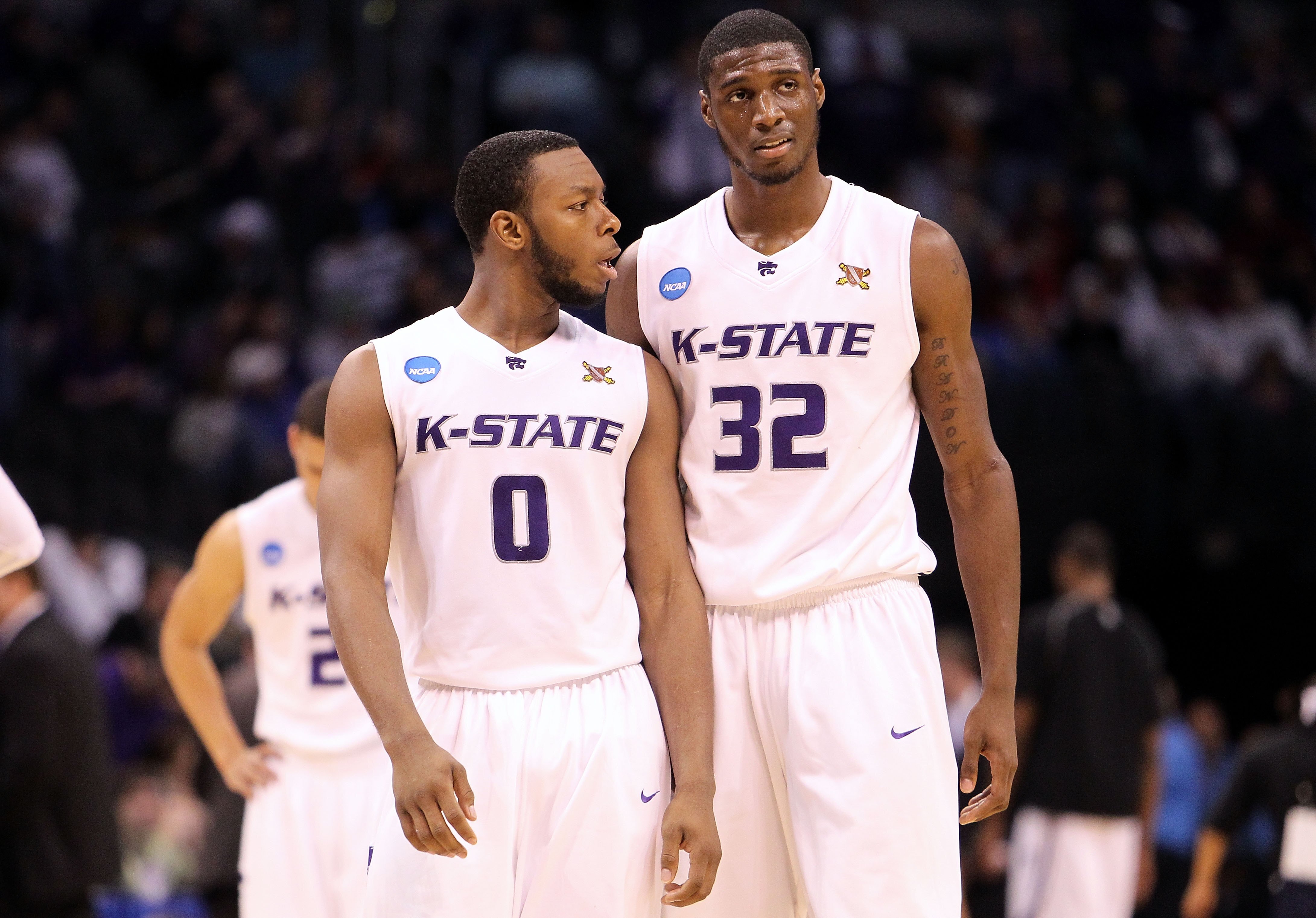 OKLAHOMA CITY - MARCH 20:  (L-R) Jacob Pullen #0 and Jamar Samuels #32 of the Kansas State Wildcats talk on court against the Brigham Young Cougars during the second round of the 2010 NCAA men's basketball tournament at Ford Center on March 20, 2010 in Ok