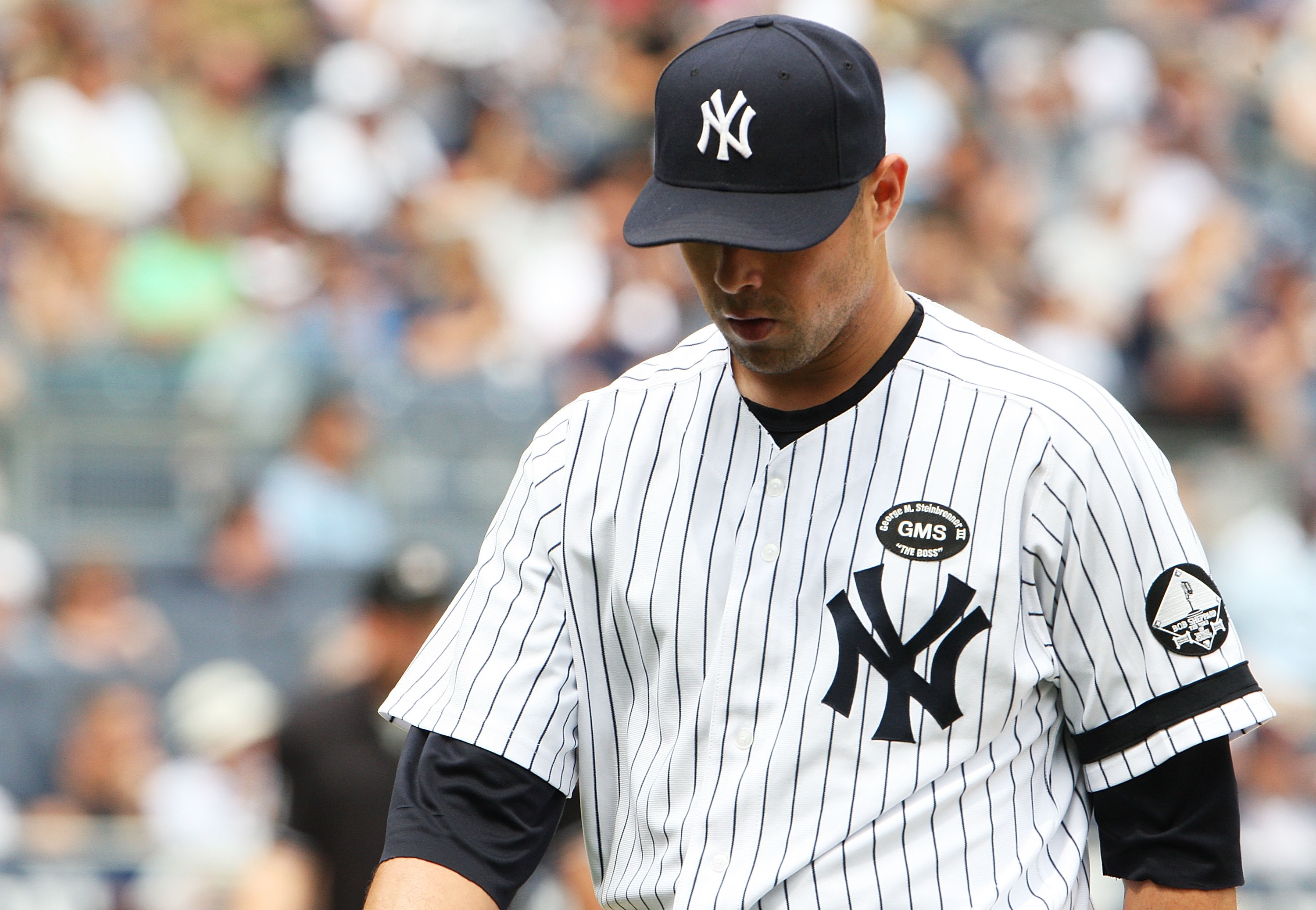 NEW YORK - AUGUST 21: Javier Vazquez #31 of the New York Yankees walks back to the dugout after allowing two homeruns in the first inning against the Seattle Mariners at Yankee Stadium on August 21, 2010 in the Bronx borough of New York City. (Photo by NEW YORK - AUGUST 21: Javier Vazquez #31 of the New York Yankees walks back to the dugout after allowing two homeruns in the first inning against the Seattle Mariners at Yankee Stadium on August 21, 2010 in the Bronx borough of New York City. (Photo by